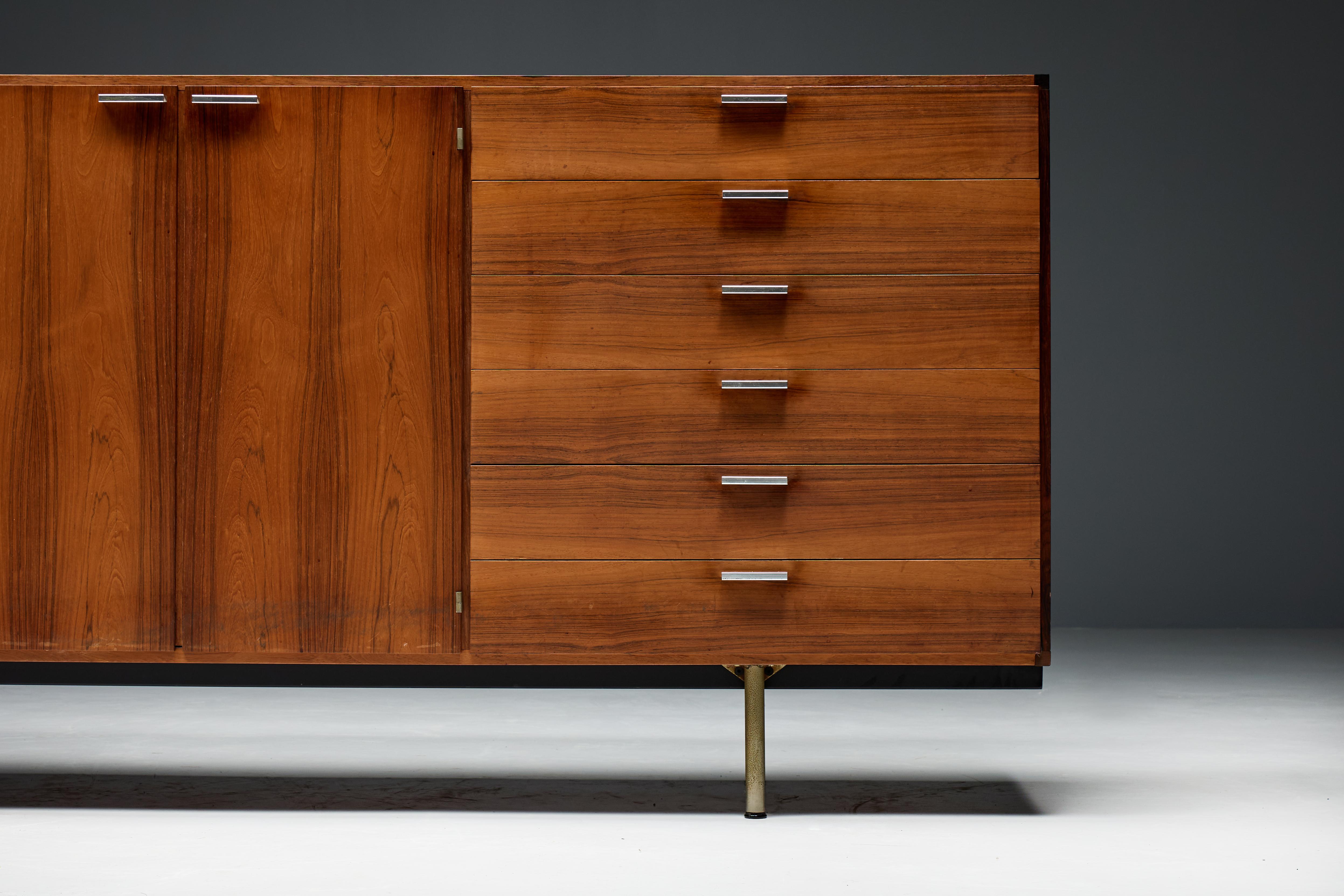 CR Series sideboard by Cees Braakman for Pastoe from the 1960s is a timeless and rare piece of furniture that embodies craftsmanship and style. This sideboard is meticulously crafted in beautiful wenge wood and adorned with metal handles. The unique