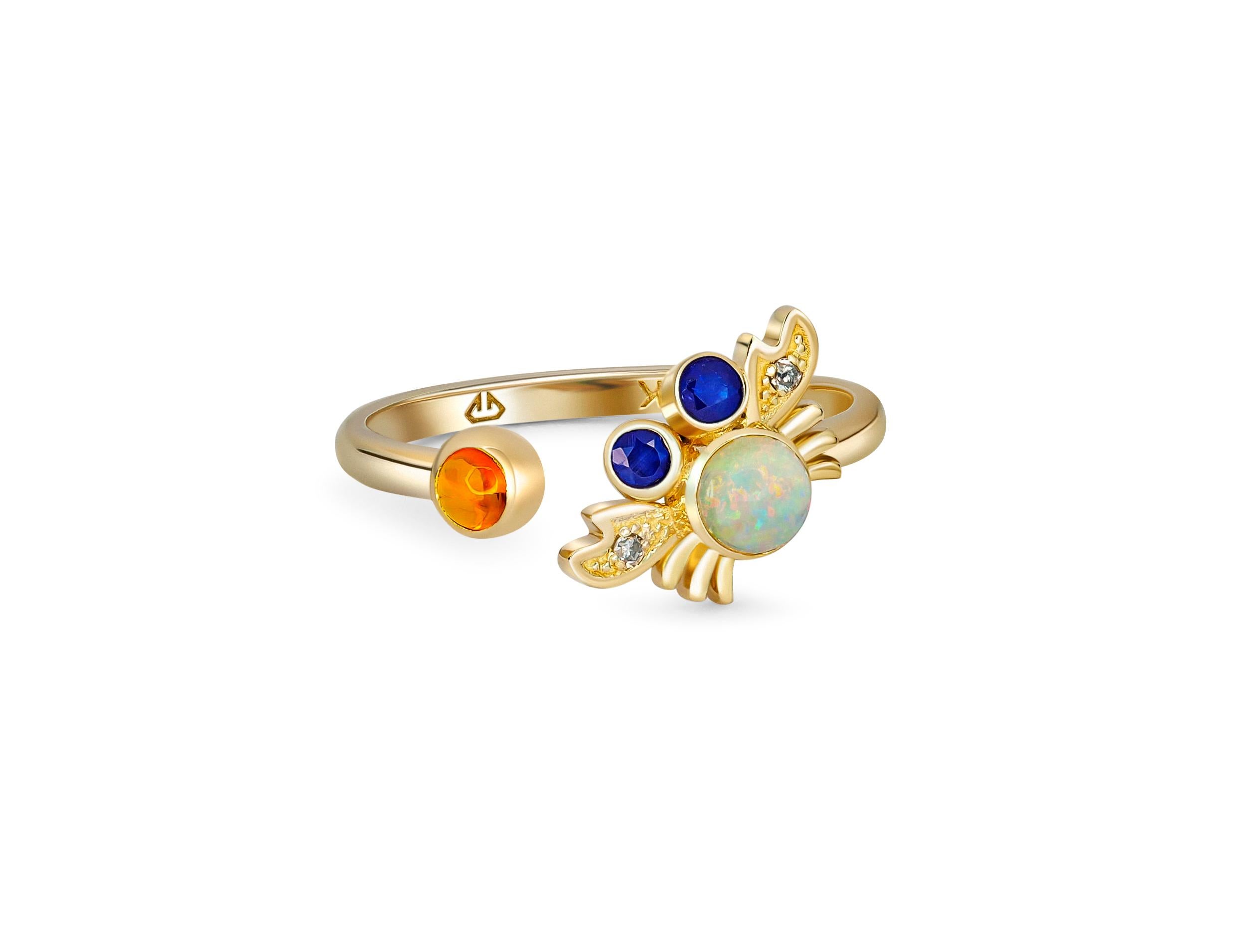 Crab gold ring with opal. 
14k gold ring with opal. Round opal gold ring. Ajustable gold ring. Animal ring with opal. Multicolor opal ring

Metal: 14k gold
Weight: 1.95 g. depends from size

Set with opal, color - multicolors
Cabochon cut, 0.45 ct.