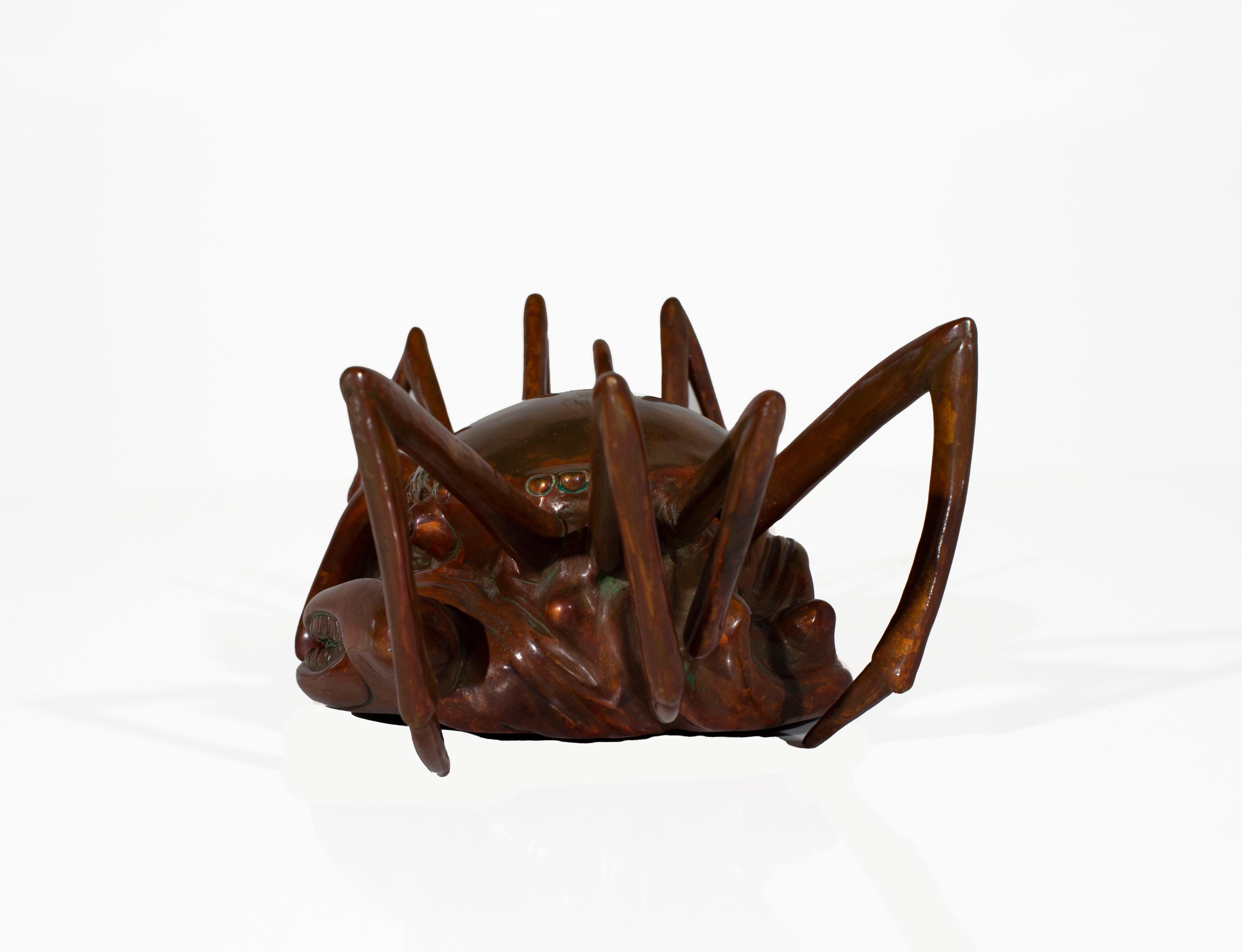 Crab paperweight

Vintage metal crab paperweight.