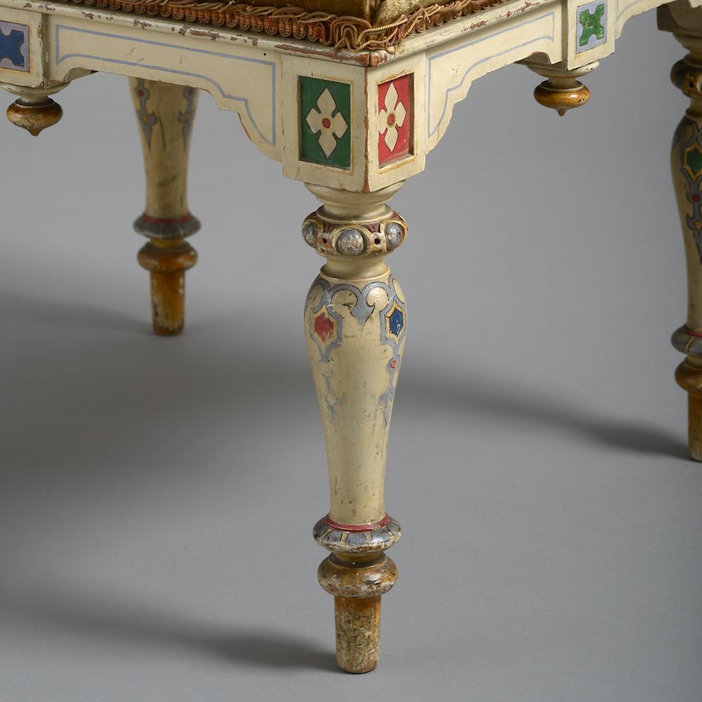 An early Victorian polychrome and gilt painted stool attributed to Crace & Sons, circa 1845.