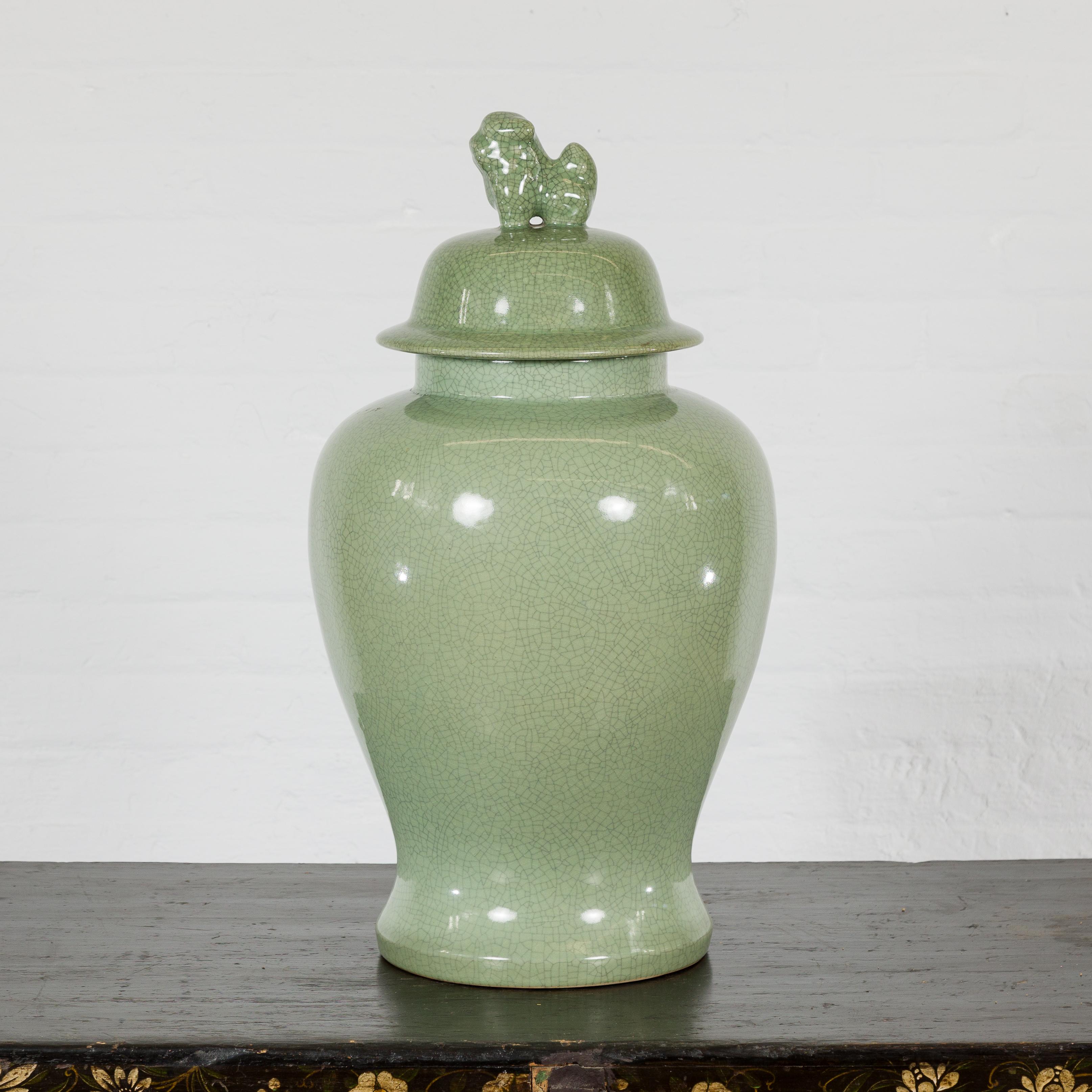 Chinese Crackle Green Celadon Lidded Vase with Stylized Foo Dog Finial For Sale