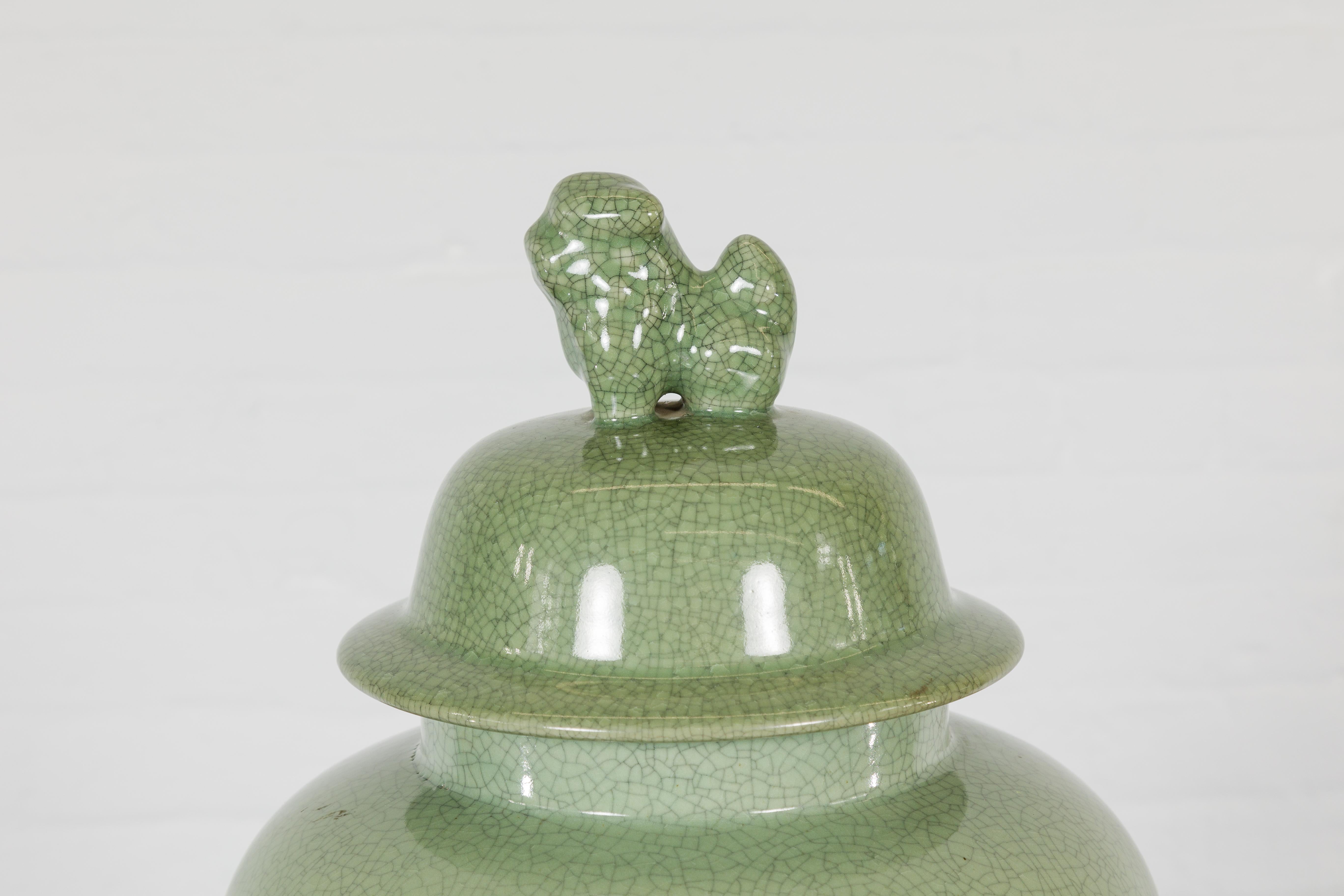 Glazed Crackle Green Celadon Lidded Vase with Stylized Foo Dog Finial For Sale