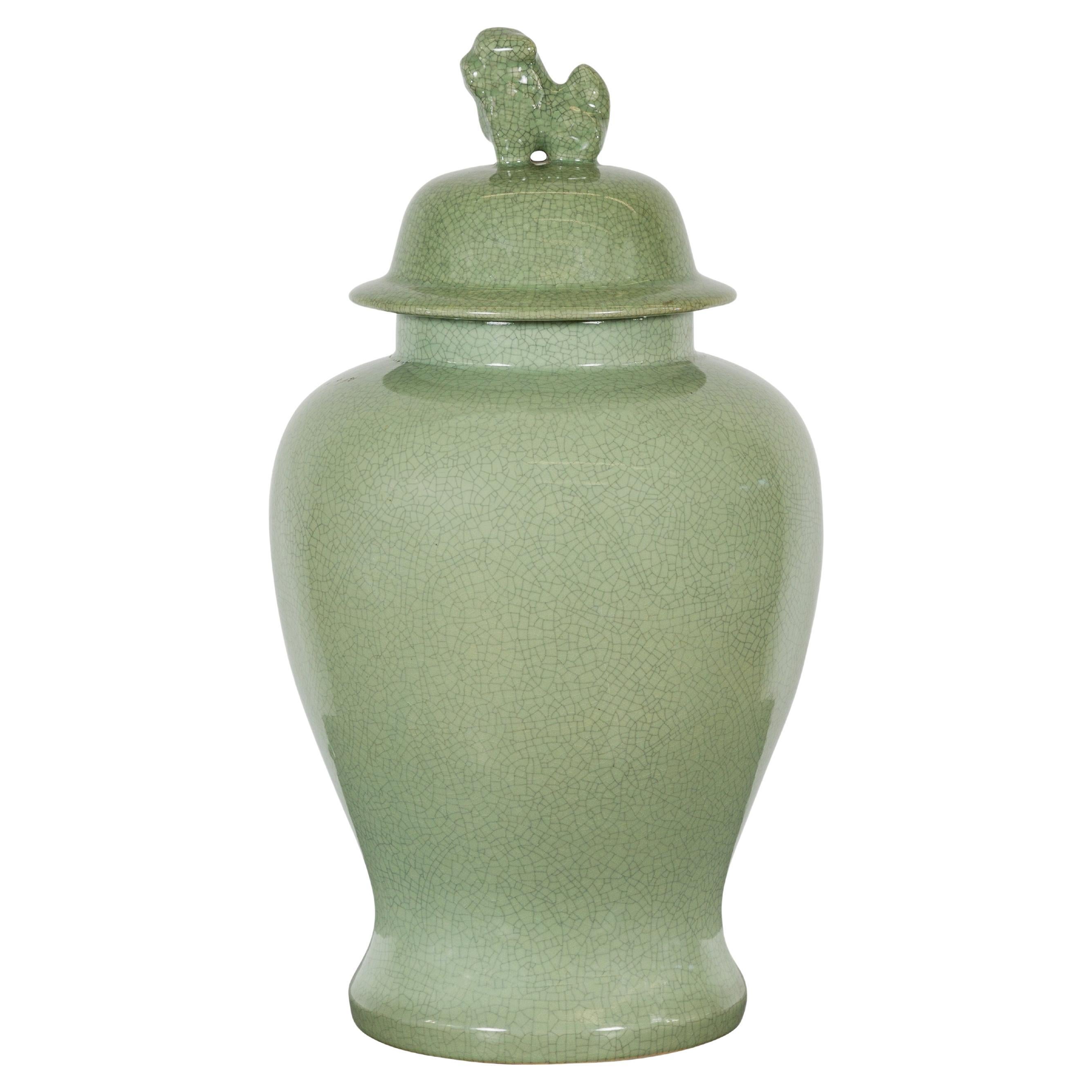 Crackle Green Celadon Lidded Vase with Stylized Foo Dog Finial For Sale