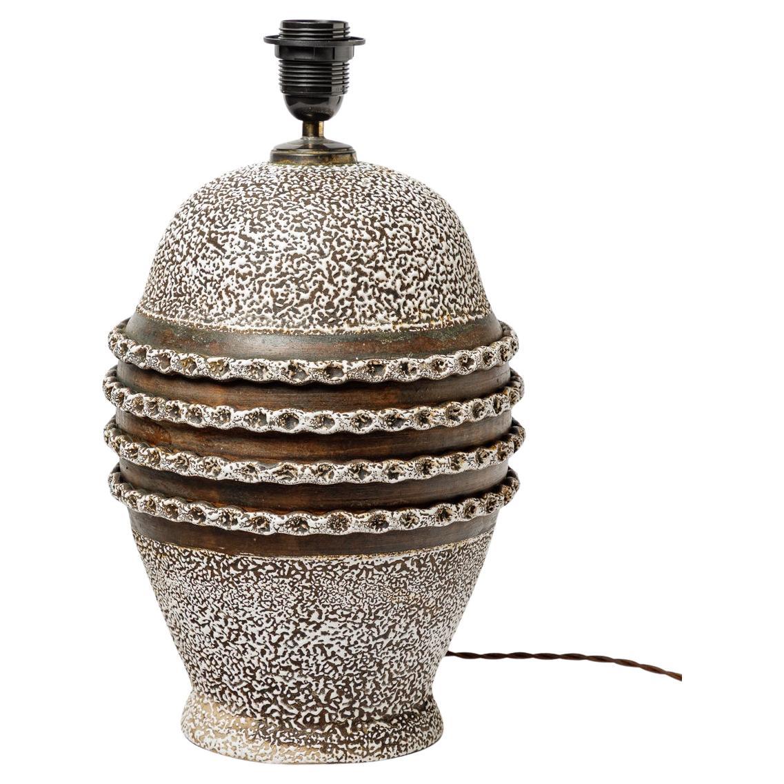Lampe de table en céramique craquelée noire et blanche émaillée, vers 1930.