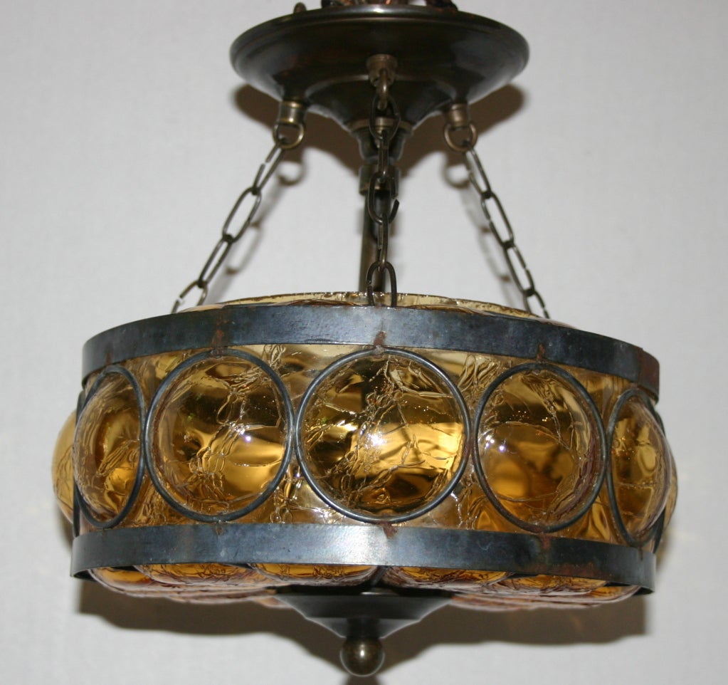 A circa 1930's crackled glass Italian lights fixture.

Measurements
Diameter: 10.5