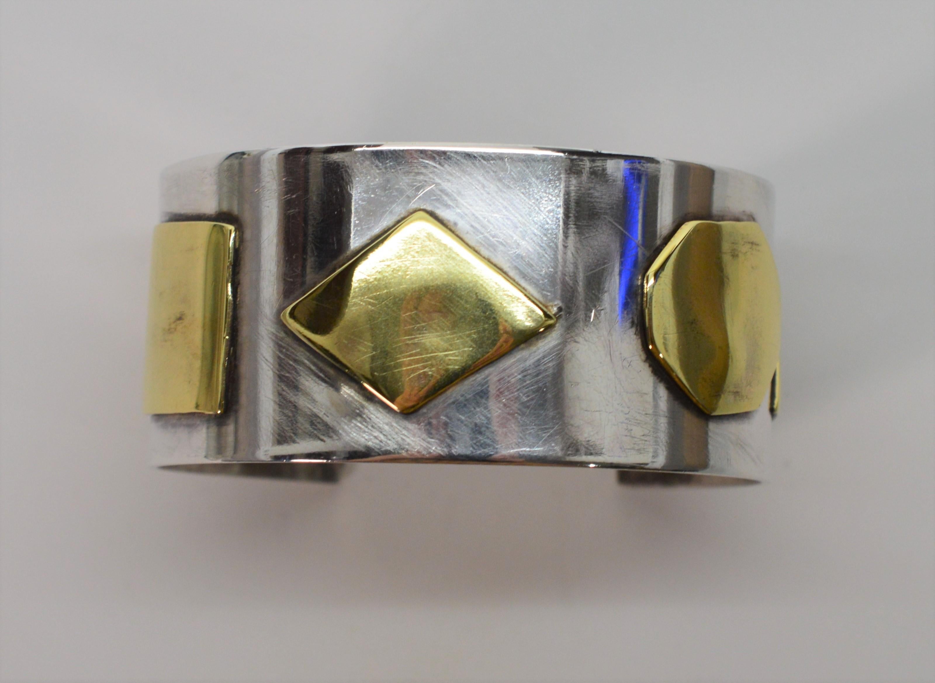 Artisan Craft Sterling Silver Cuff Bracelet with Brass Appliques For Sale