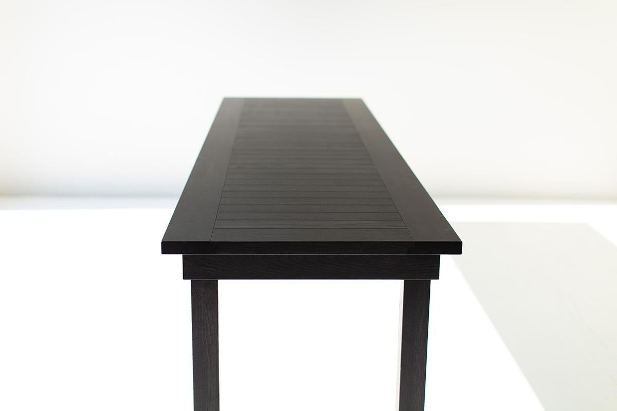 Craft Associates dining table, modern wood dining table, black, slatted, catawba.

This Catawba dining table Craft Associates® Furniture is made in the heart of Ohio with locally sourced wood. We use the table both as a modern dining table or