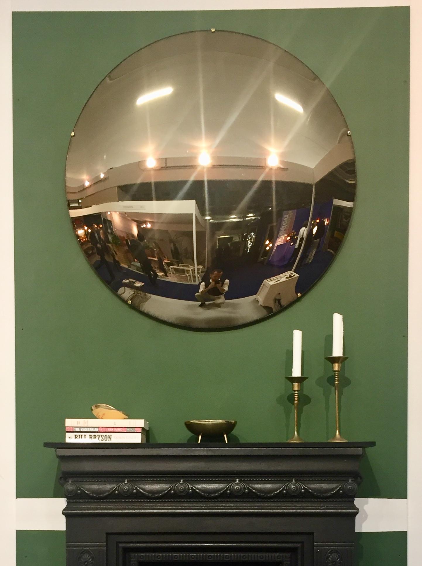 Handcrafted frameless bronze tinted convex mirror.

Each Orbis convex mirror is handcrafted. Slight variations in dimensions, tint and finish are characteristics of such handcrafted work. These characteristics enhance the beauty of the mirrors and