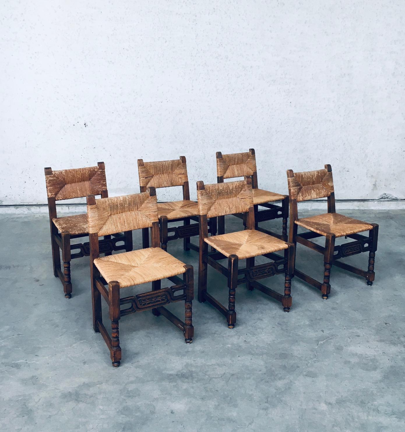 Vintage French Craftmanship Oak & Rush Dining Chairs set of 6 with sculptural legs. Made in France, 1940's. Solid oak constructed and carved frame and legs with rush seat and back. In the style of Tudor or Cromwelian design chairs. These chairs are