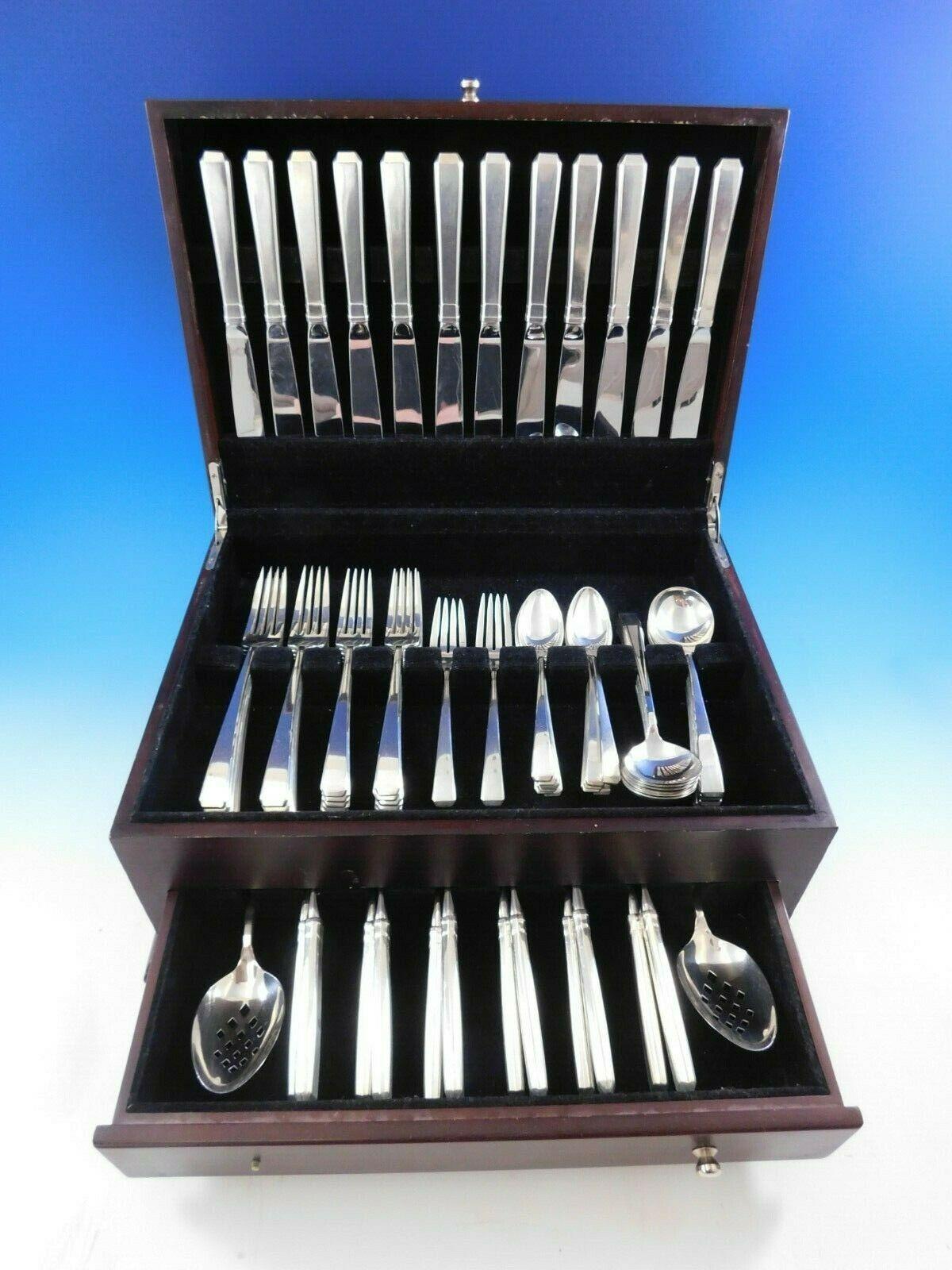 Dinner and luncheon size Craftsman by Towle sterling silver flatware set, 86 pieces. This set includes:

12 dinner size knives, 9 1/2