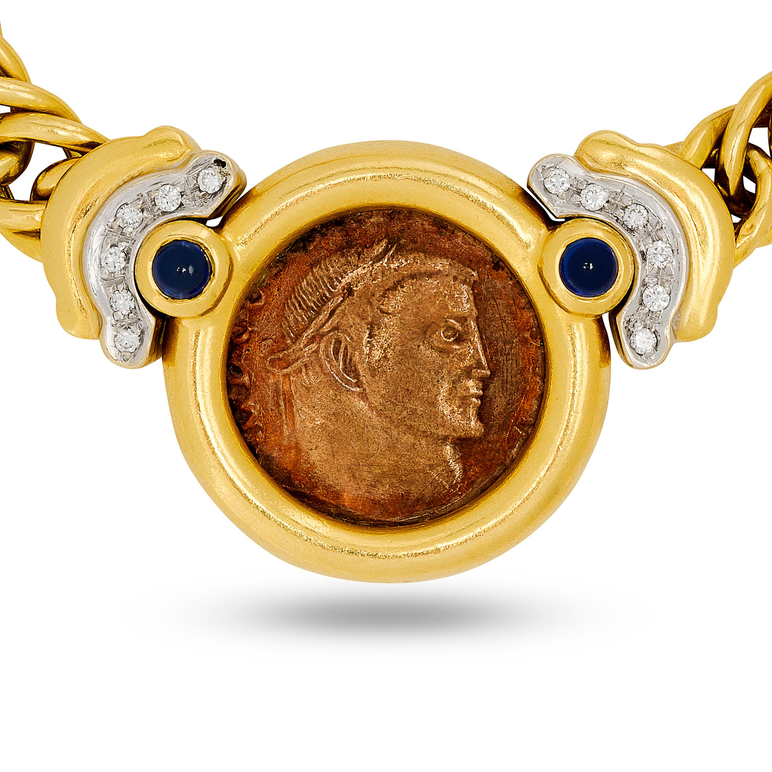 This Craig Drake necklace, made in 18 karat yellow gold, features a striking coin pendant, meticulously set with vibrant sapphires and sparkling diamonds, creating a luxurious and distinctive statement piece.

2 cabochon sapphires
12 round diamonds