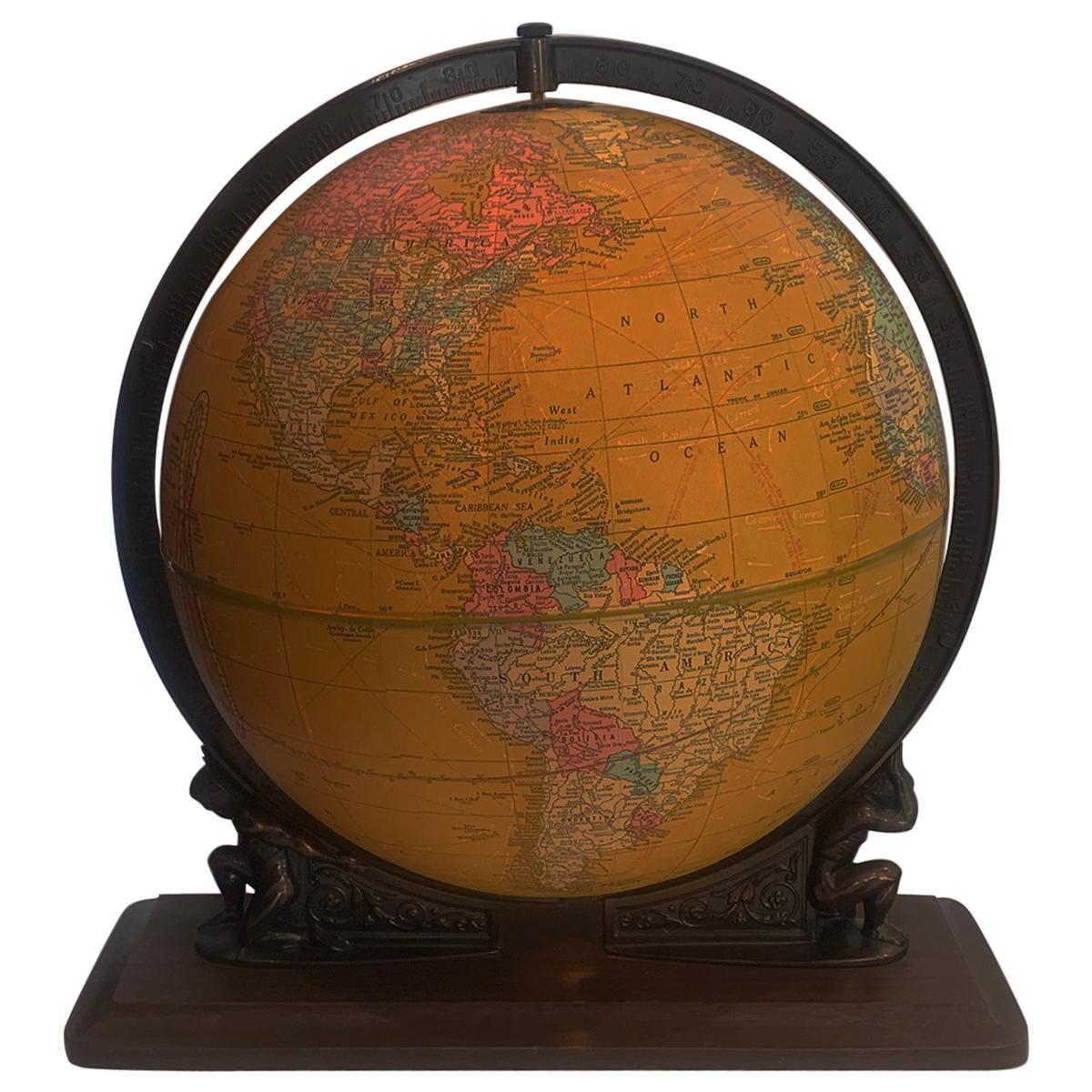 Crams Illuminated World Terrestrial Globe sitting on the shoulders of Atlas