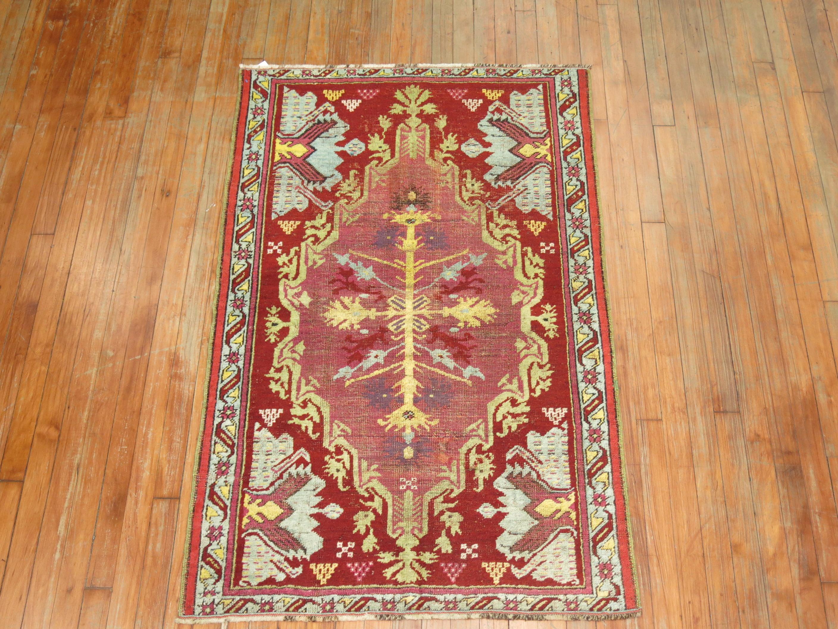 A one of a kind antique Turkish Ghiordes Scatter Size rug from the late 19th Century

Measures: 3'1'' x 5'.