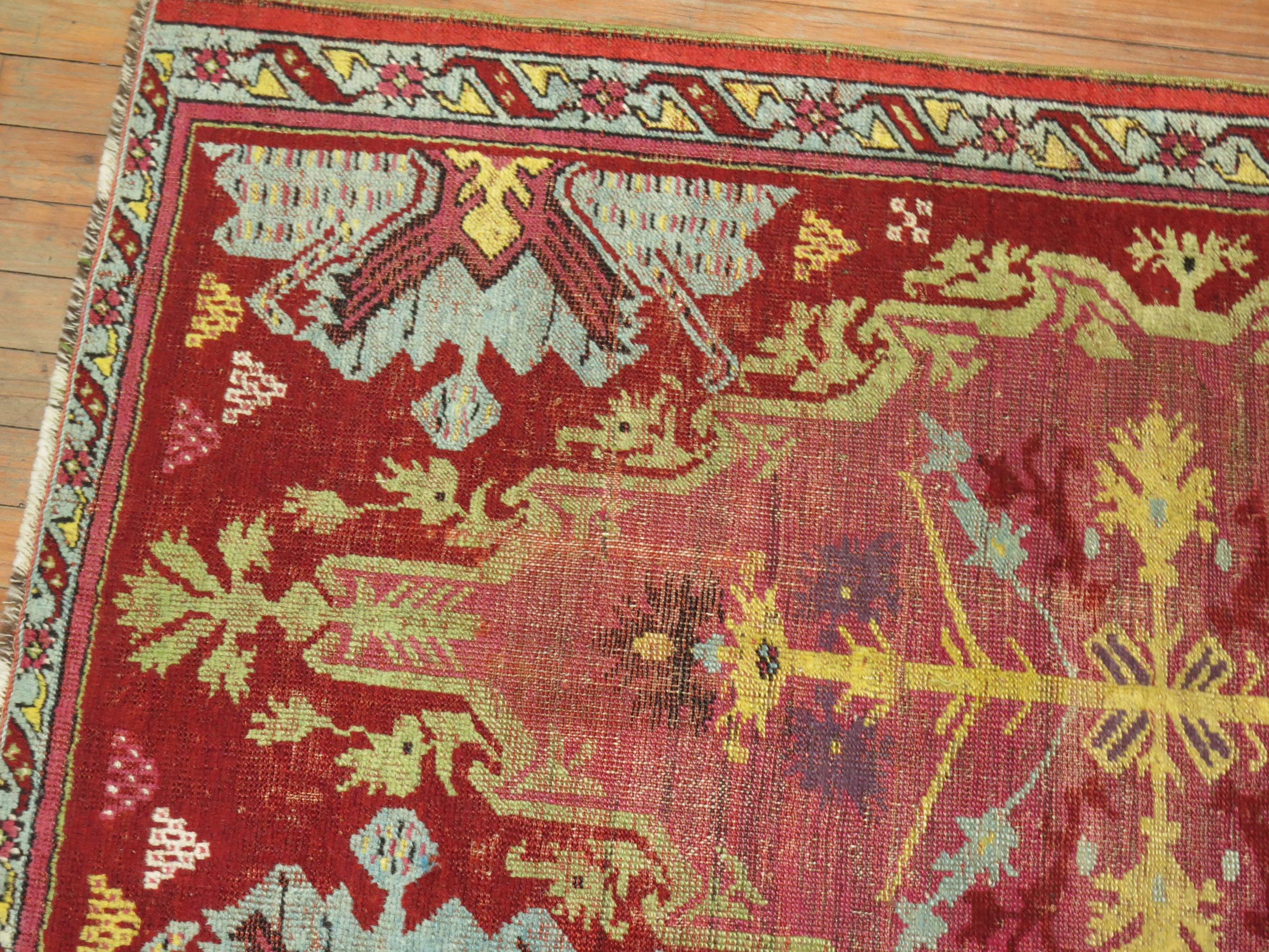 Islamic Cranberry 19th Century Antique Turkish Ghiordes Rug For Sale