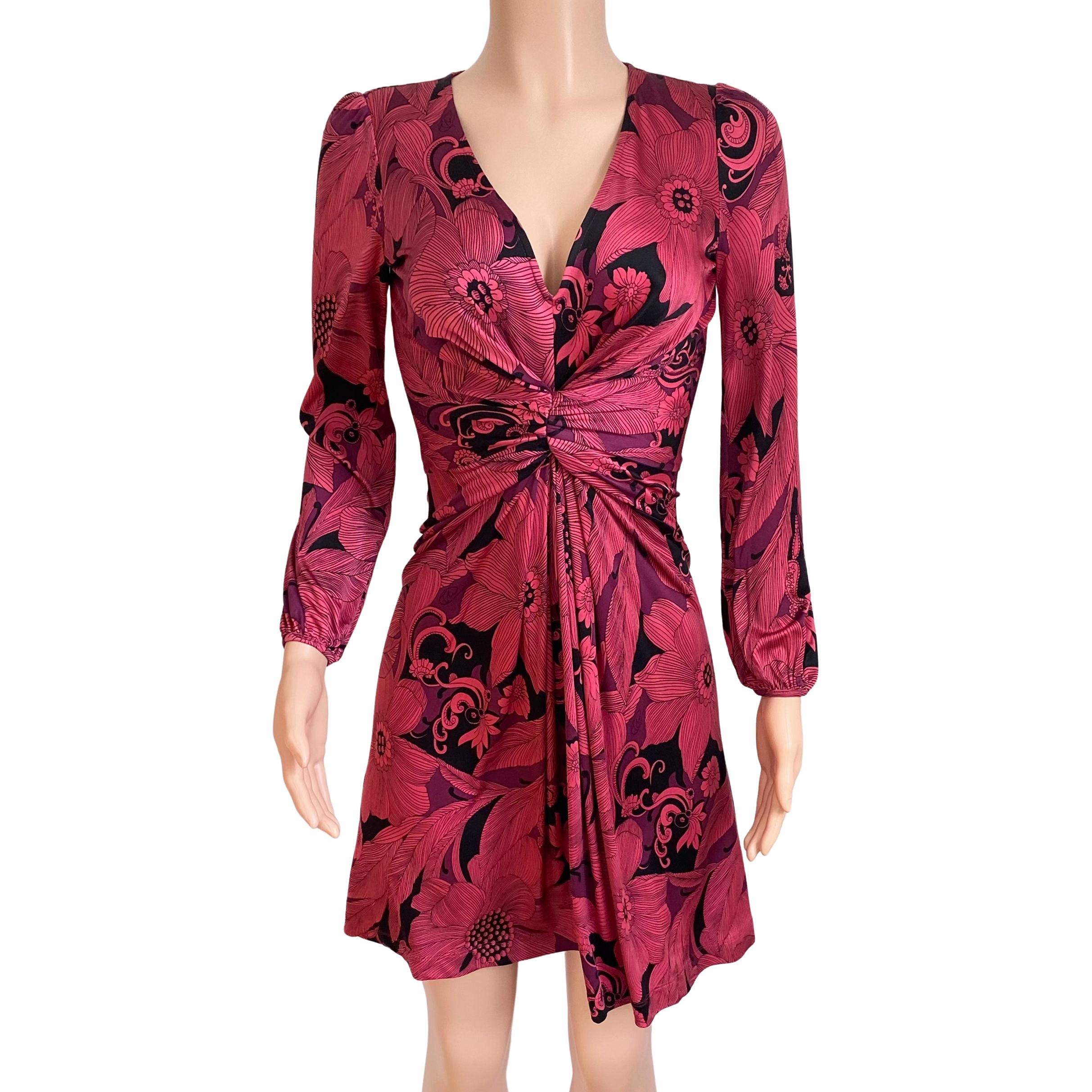 Condition: NEW WITH TAG.
Fabric: Silk Jersey 
Print: Exclusive etched floral print in cranberry and black. 
Deep plunge V-neck. Invisible zipper back. Lots of volume in movement,
Approximately 38