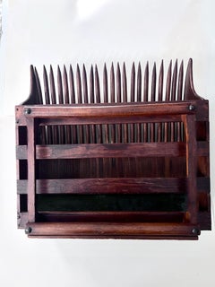 Raccoglitore di mirtilli rossi con rastrello