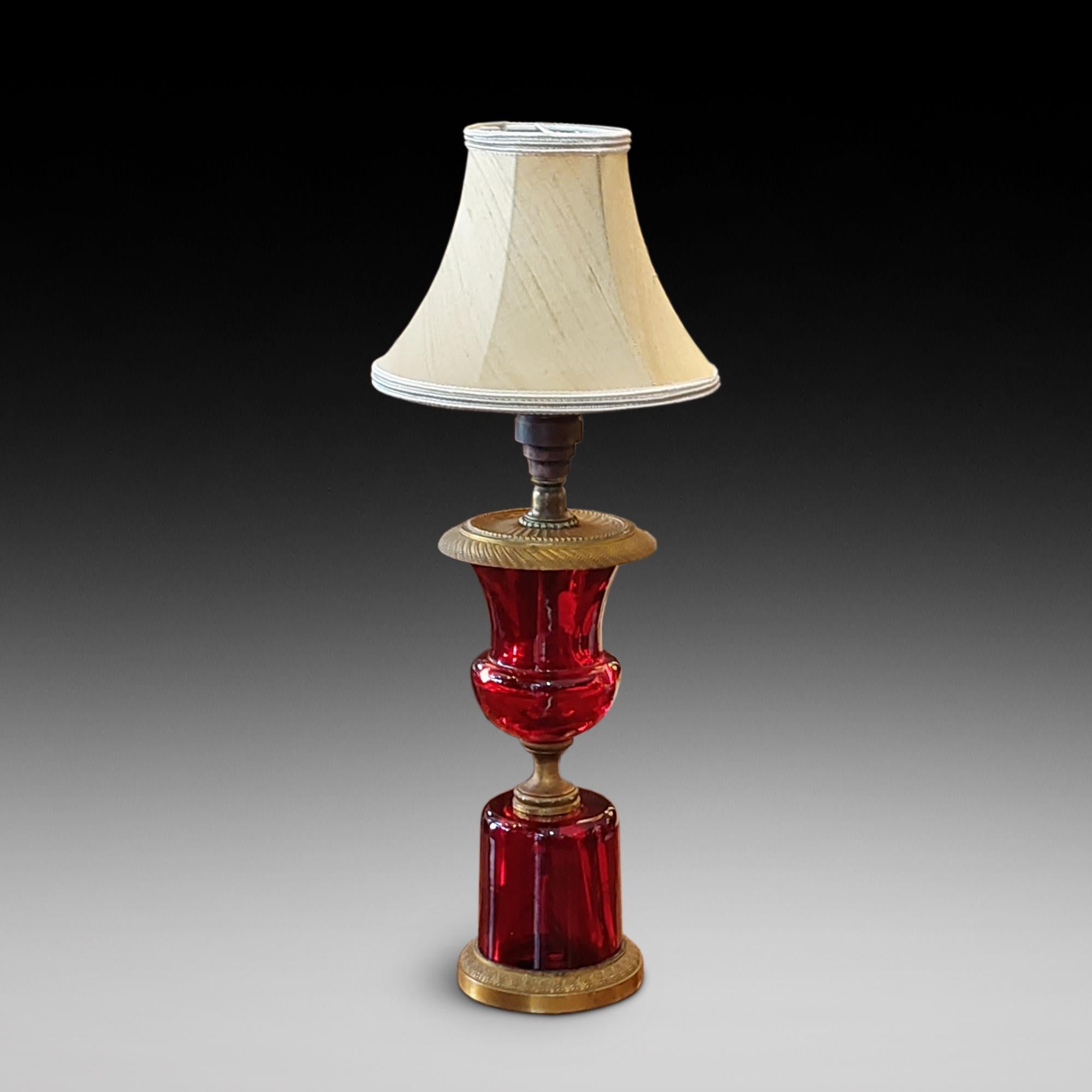 Late 19thC Cranberry Glass and Ormalu Table Lamp of Hour Glass Form (converted from oil lamp) - - The lampshade(s) are newly handmade silks by the same maker as provides the shades for Downton Abbey - all lights and lamps have been rewired with