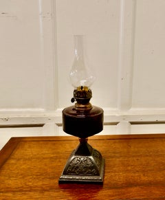 Cranberry Glass Oil Lamp on Iron Base, Victorian Style, 19th Century