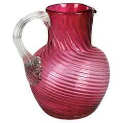 Jarra de agua de vidrio en espiral con asa de vidrio aplicada S. XX