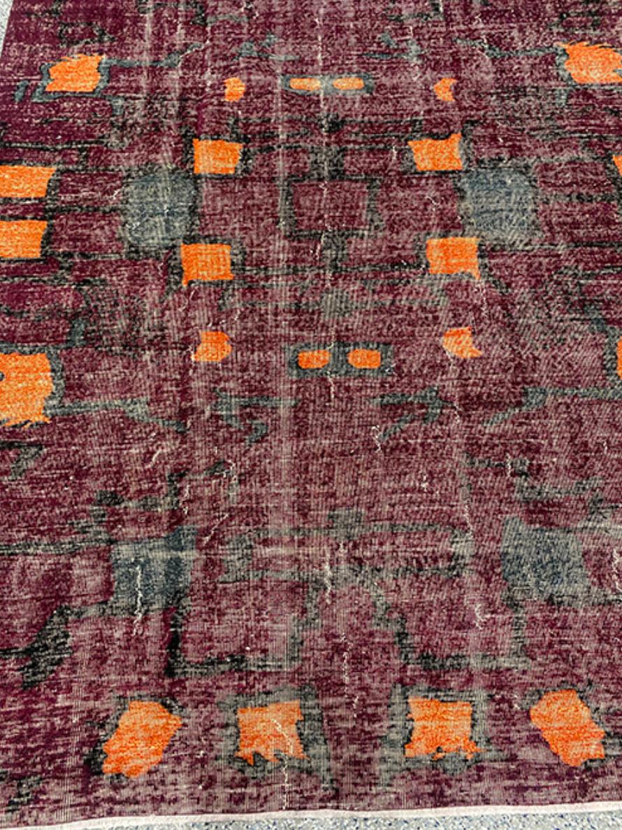 Orgin: Turkey
Dimensions: 6’10” x 9’9?
Age: 1950’s
Design: Zeki Mu¨ren
Material: 100% Wool-pile
Color: Shiraz, Neon Orange, Charcoal

16497

Mysterious, bold, wine-colored rug with artful pop of orange.