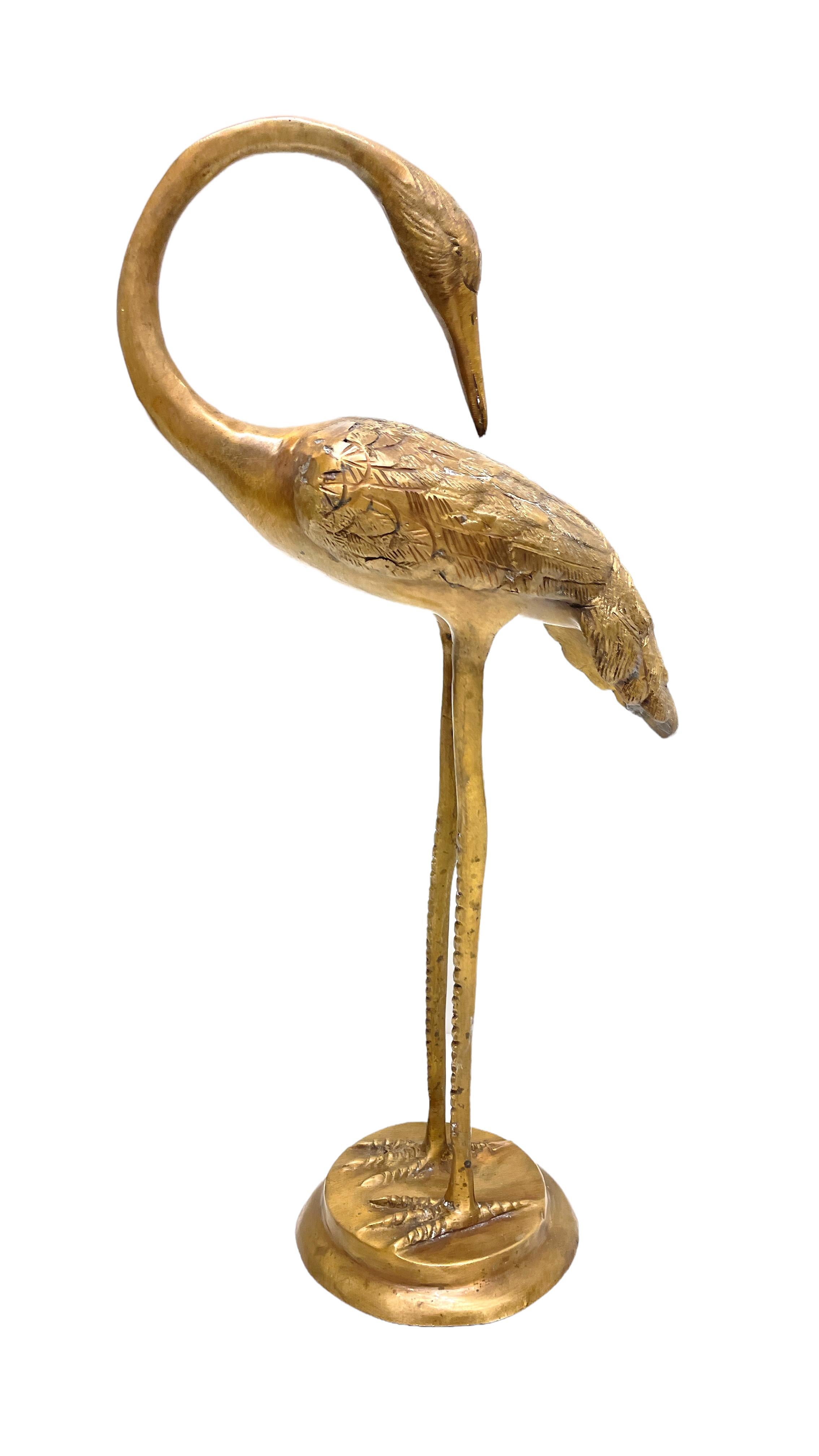 brass crane statue