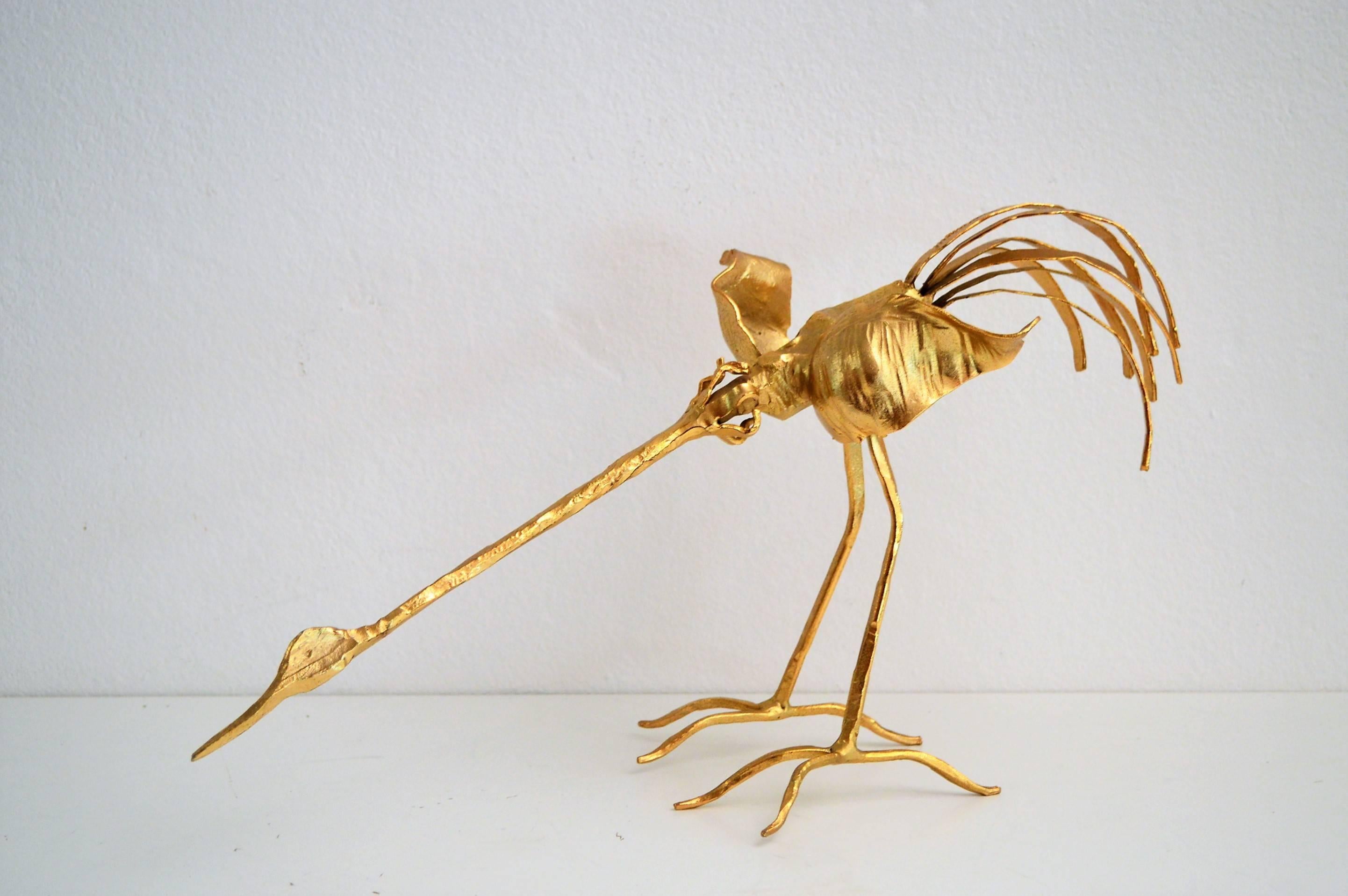 Gorgeous signed crane sculpture made of gilt wrought iron by Salvino Marsura in Italy during the late 1960s.
The sculpture is very shiny and in excellent condition.
Objects from Marsura are mostly sold in auction houses.

Salvino Marsura is an