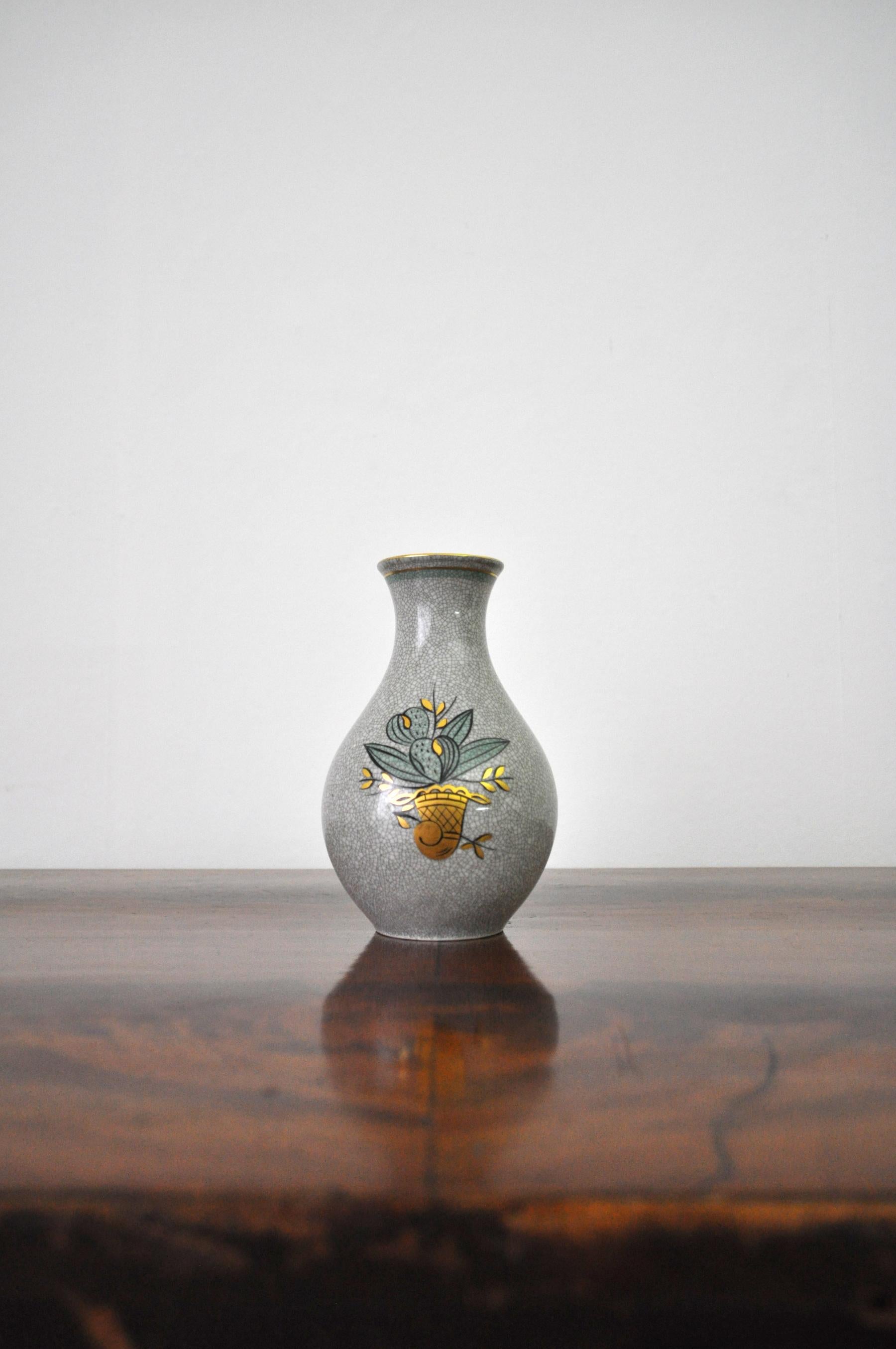 Craquele glaze porcelain vase, gold and green on grey 10.5 x 16 cm Kjøbenhavns Porcellains Maleri (Lyngby Porcelain KPM) 73.2-3628 

Kjøbenhavns Porcellains Maleri (KPM) was founded in 1883 and was acquired by Holst & Knudsen in 1924. The
