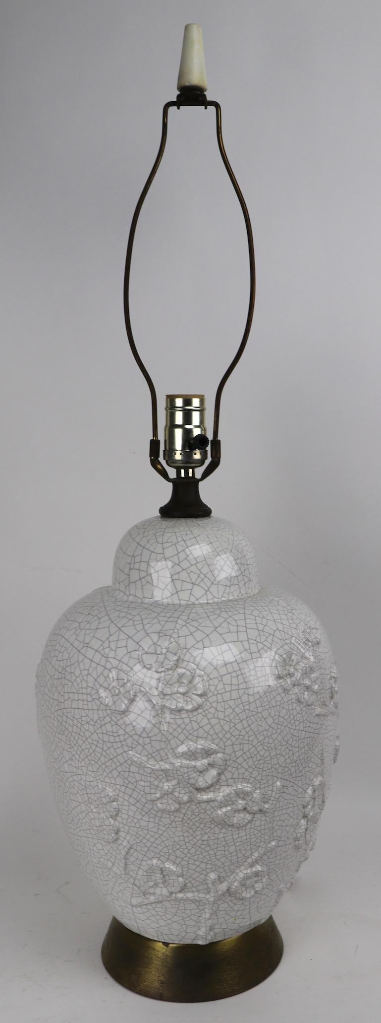 Stylish Blanc de Chine Craquelure glaze Chinese style table lamp. Nice vintage example in clean, original and working condition, shade not included. Height to top of socket 19 inches x total H 30 inches.