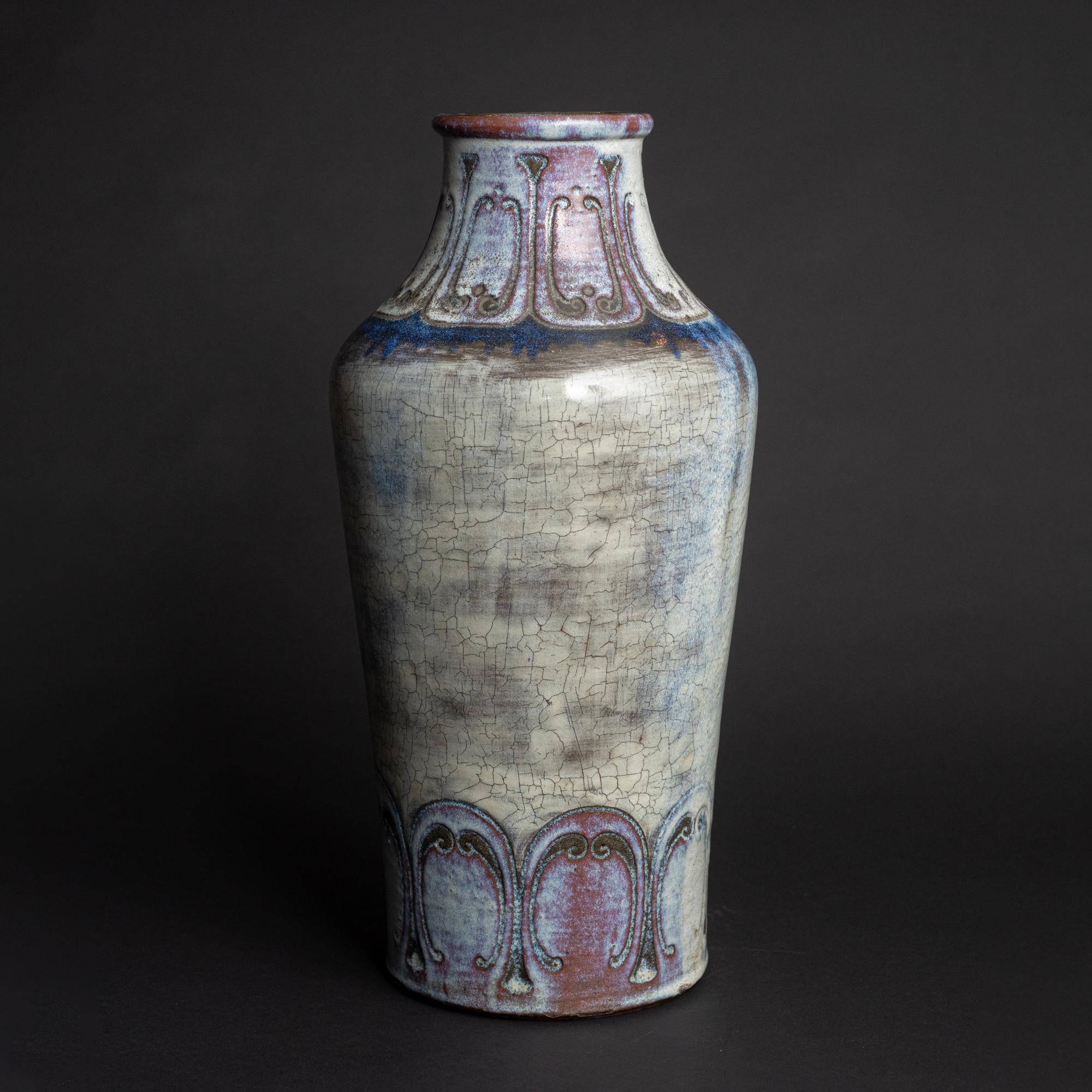 Model #1990. Auguste Delaherche turned the science of experimentation in ceramic ware into an art form. Coming from a long tradition of potters in the Beauvais region of France dating back to antiquity, Delaherche displayed a fascination and an