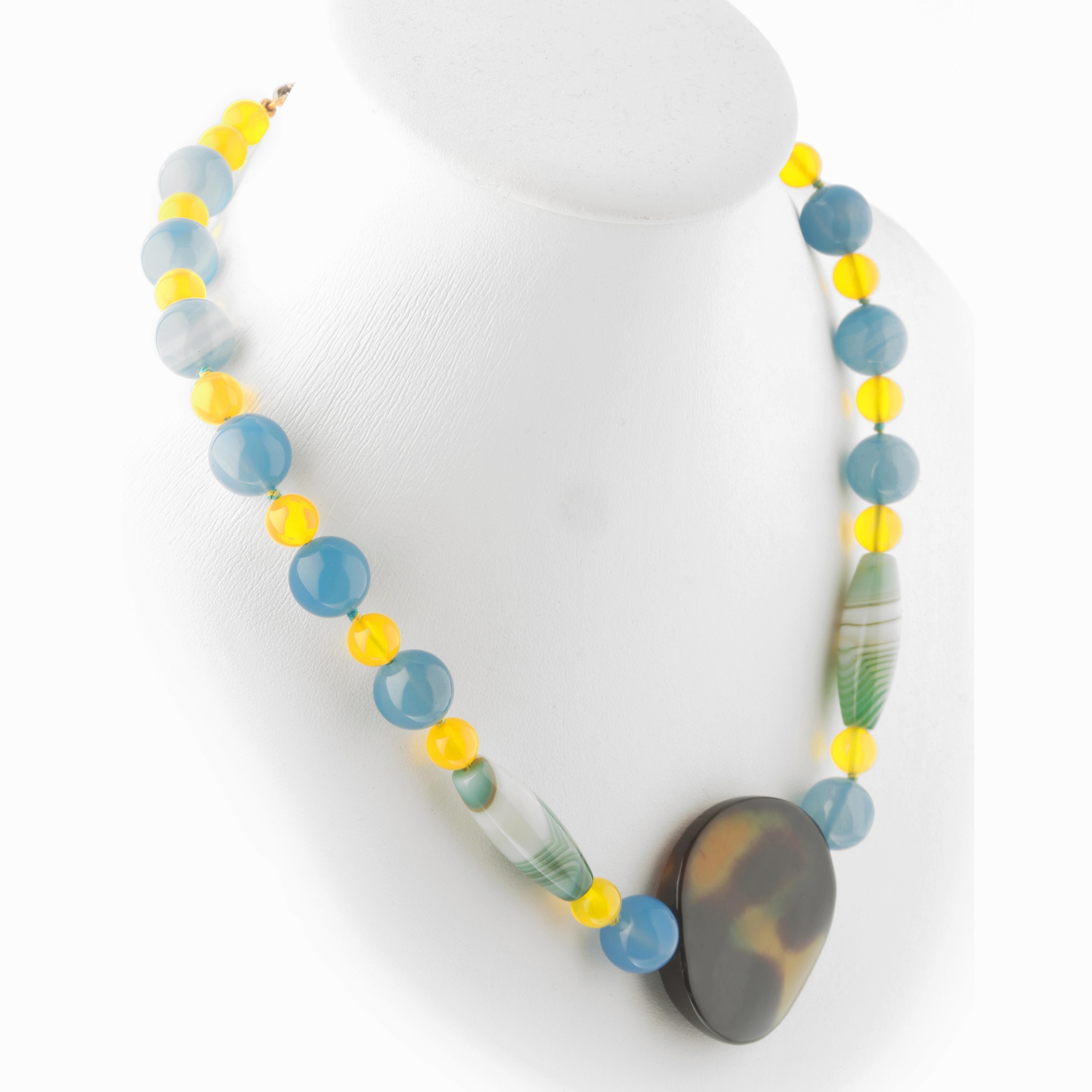 Light and luminous necklace with Agate and Citrine stones. Abstract jewellery 925 sterling silver piece inspired by the beauty of the diversity, asymmetry and color. Stunning masterpiece with a range of diverse gems and hues that rise into a