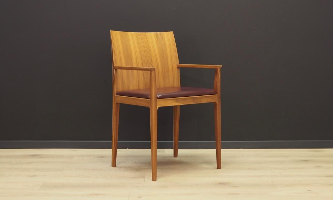 Superb armchair from the 1990s. Model Anna P designed by Ludovica & Roberto Palomba, manufactured by Crassevig. Construction made of walnut wood, original leather upholstery. Maintained in good condition (minor bruises and scratches), directly for