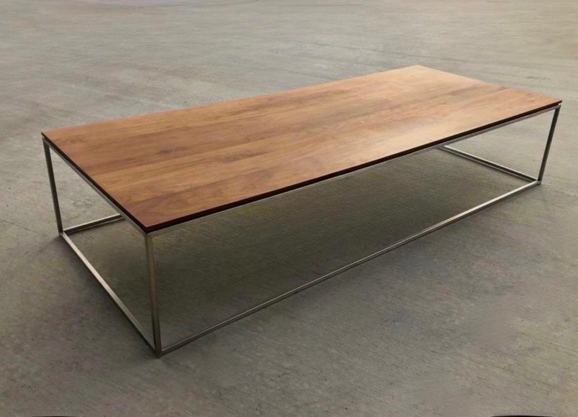 Beautiful Crate & Barrel coffee table. This is the large size which is no longer available. Solid WALNUT Wood rectangular low profile top has a sleek, modern, minimalist look paired with a matte silver metal frame. Beautiful condition. Only a couple