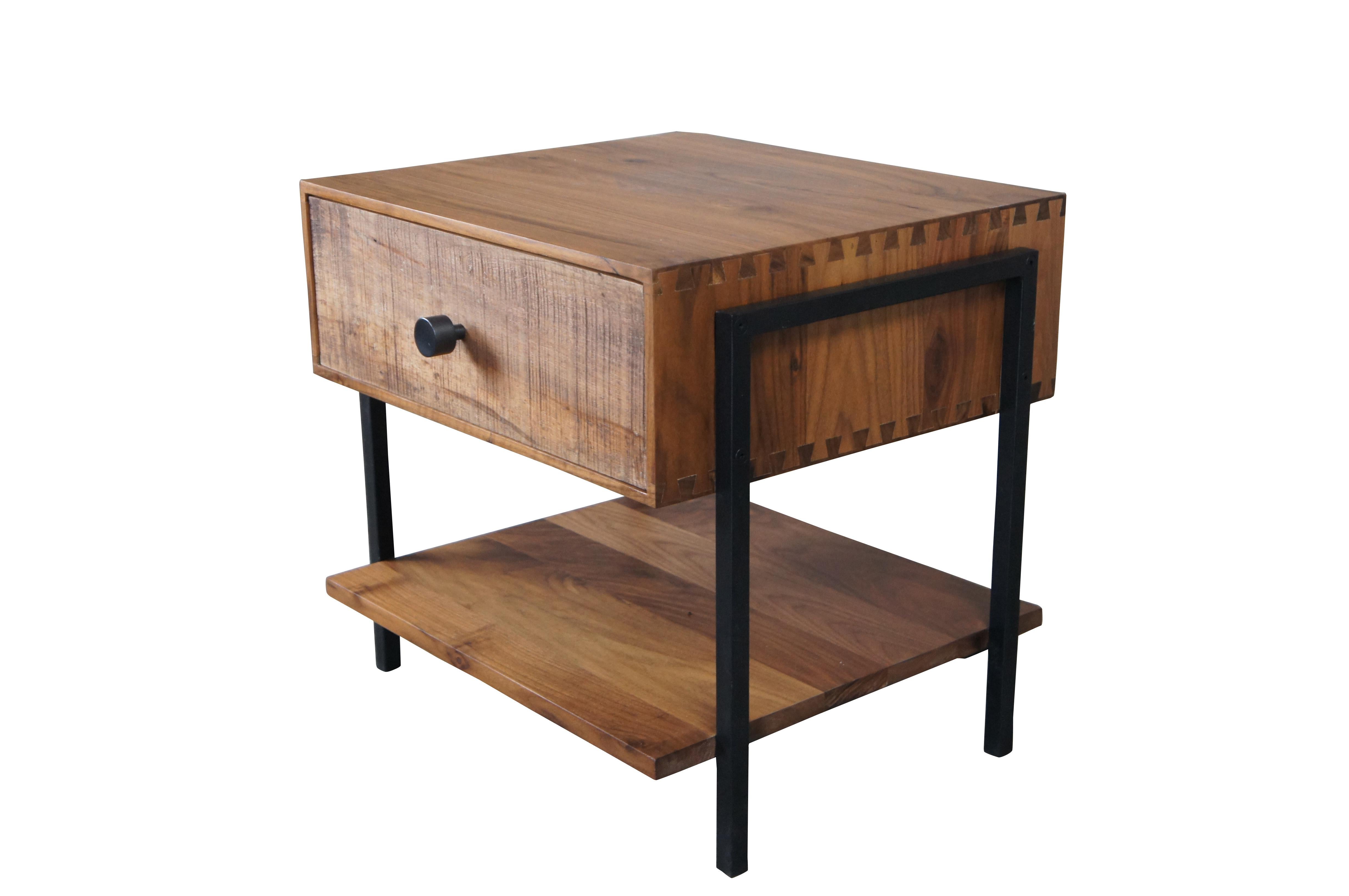 Atwood nightstand's eclectic nature mixes rustic reclaimed peroba wood from Brazil with refined solid black walnut. This nightstand's uniquely weathered peroba wood drawer and a bottom shelf offer generous storage, supported by a walnut frame with