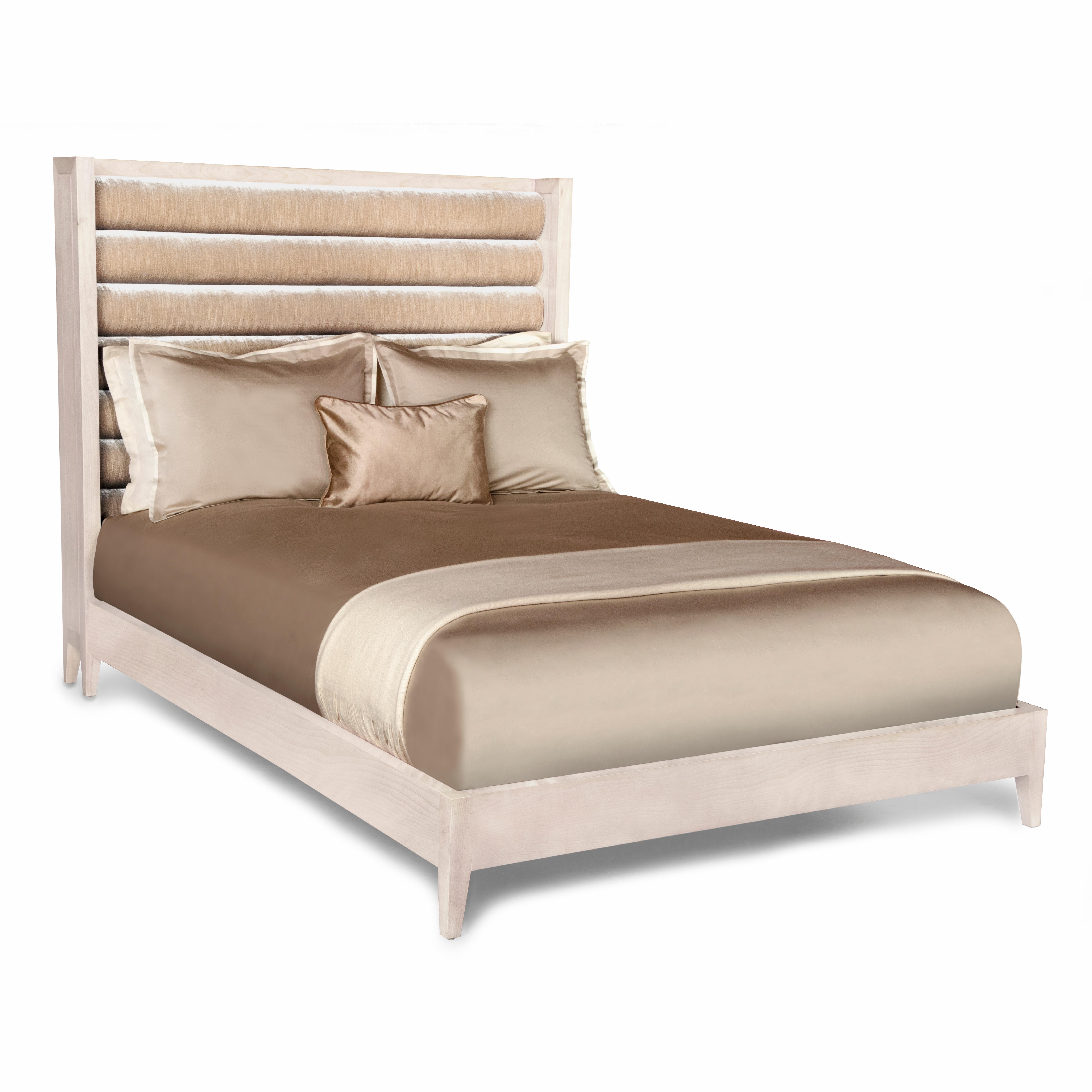 The Crawford bed is a stylish and chic bedroom mainstay. With its horizontal channel tufted headboard, tapered legs, and blush stained wood, this bed provides luxurious comfort while exuding sophistication, warmth, and elegance. The wood is sanded,