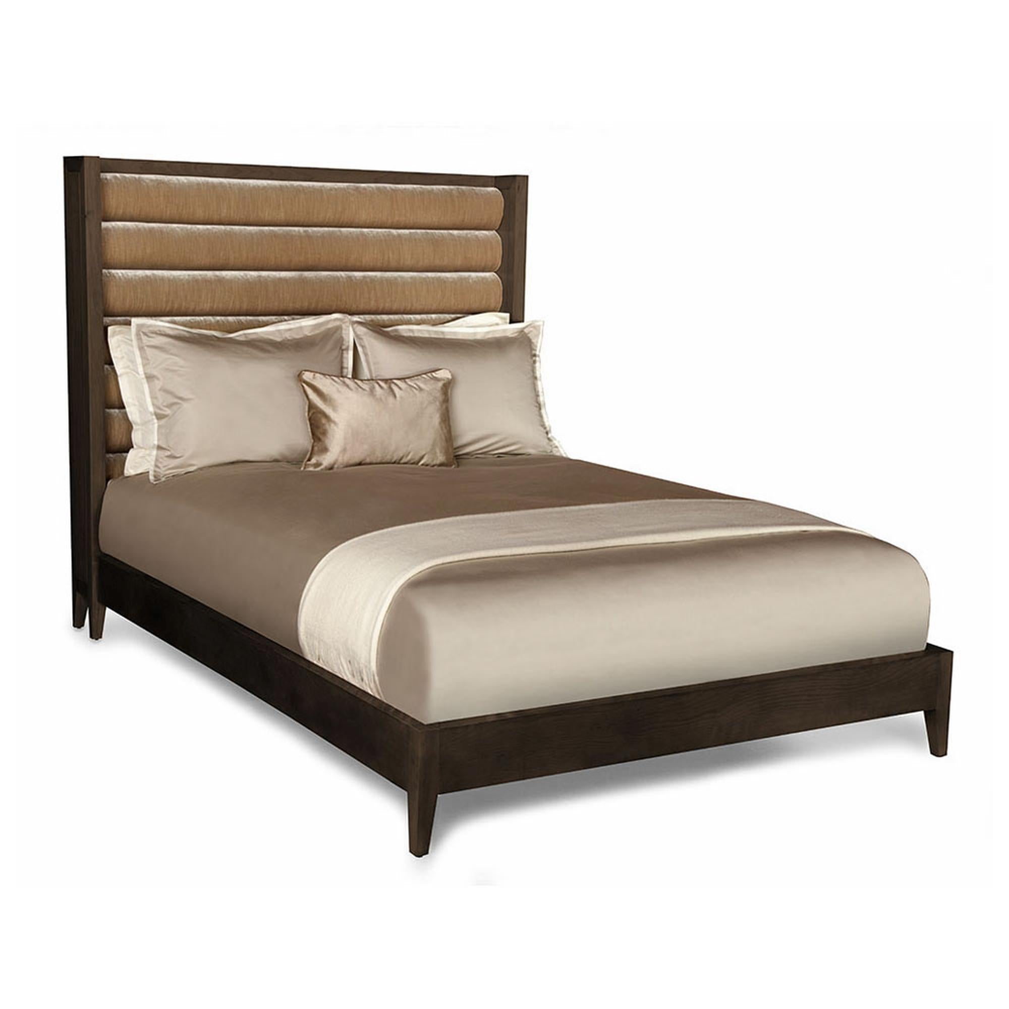 The Crawford bed is a stylish and chic bedroom mainstay. With its horizontal channel tufted headboard, tapered legs, and blush stained wood, this bed provides luxurious comfort while exuding sophistication, warmth, and elegance. The wood is sanded,