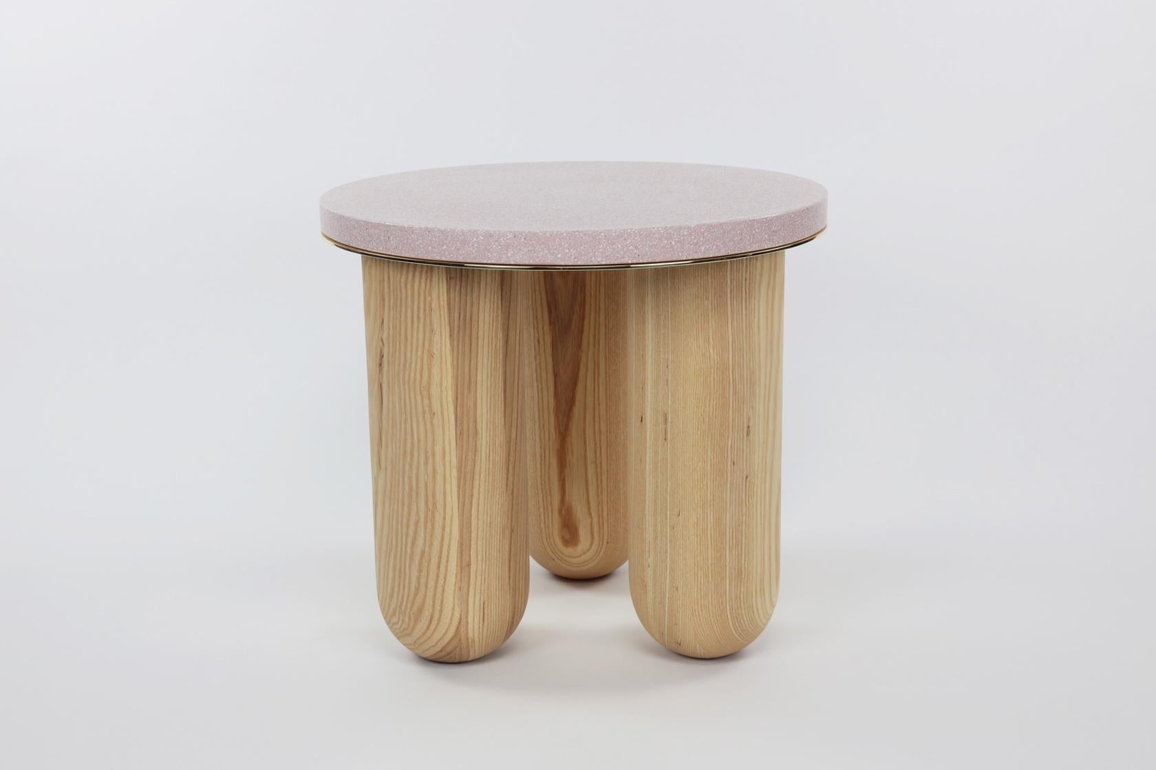 Six inch diameter turnt legs support a blush terrazzo top sitting on a plate of polished brass. The table is contemporary with a classic feel sure to pass the test of time!
Made in Los Angeles.
Signed.