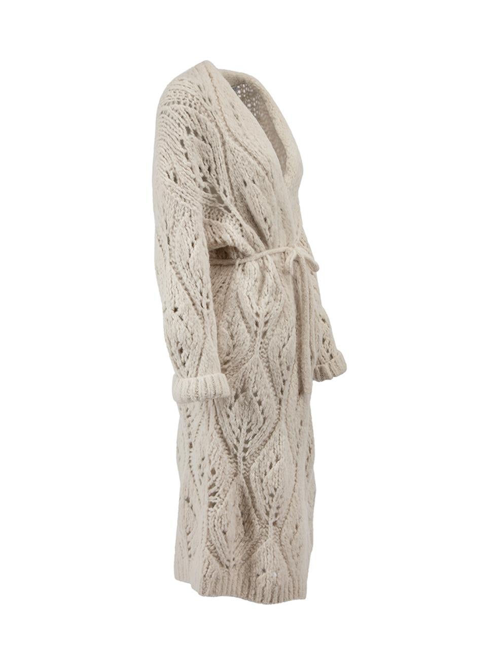 CONDITION is Very good. Hardly any visible wear to cardigan is evident on this used Brunello Cucinelli designer resale item.



Details


Cream

Alpaca wool

Long cardigan

Chunky loose knitted

Belted

Open front

Front side pockets with snap