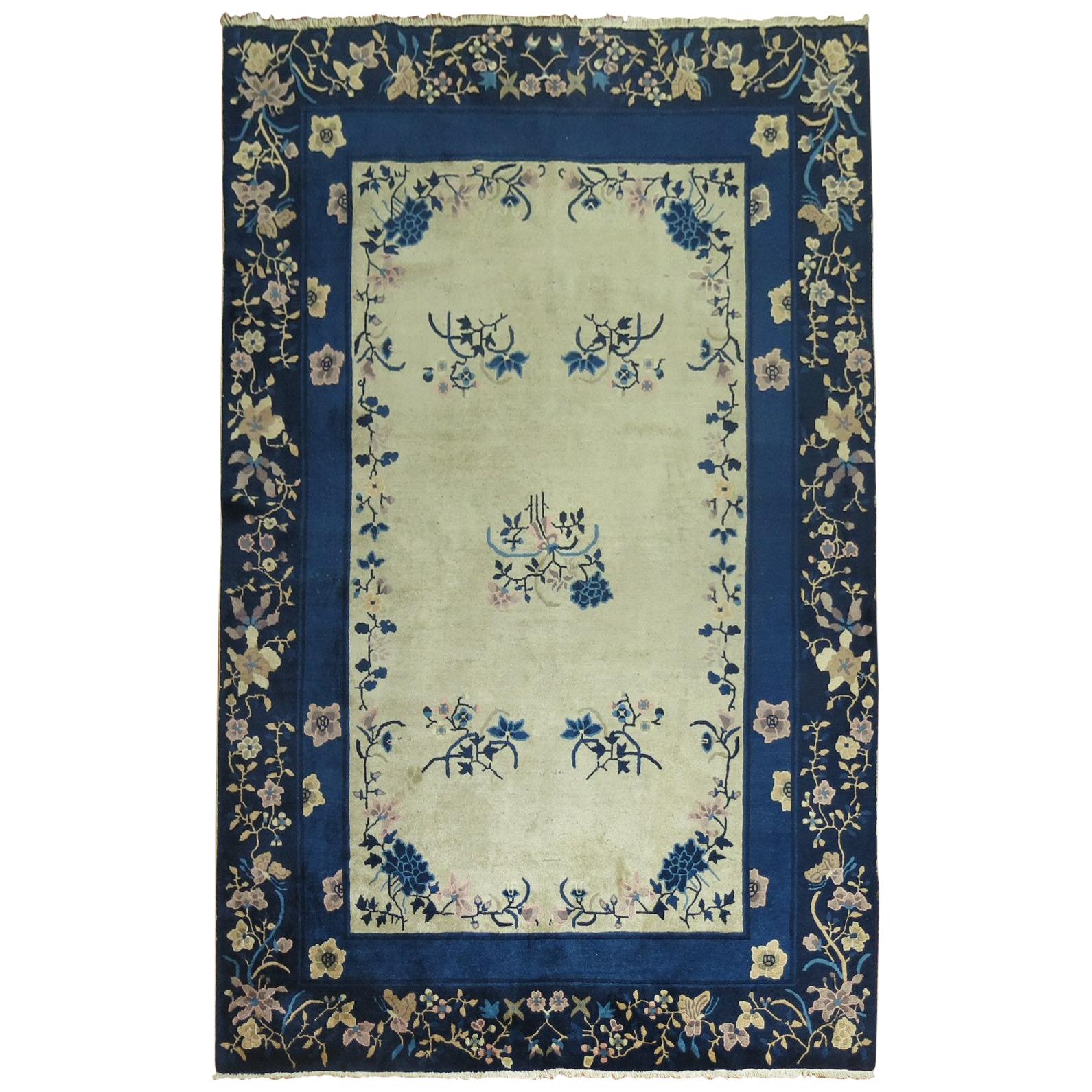 Cream and Blue Chinese Rug
