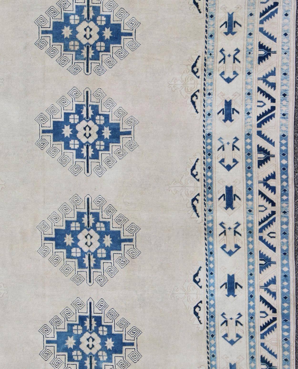 Hand-Knotted Cream and Blue Geometric Four Medallion Design Vintage Turkish Oushak Rug For Sale