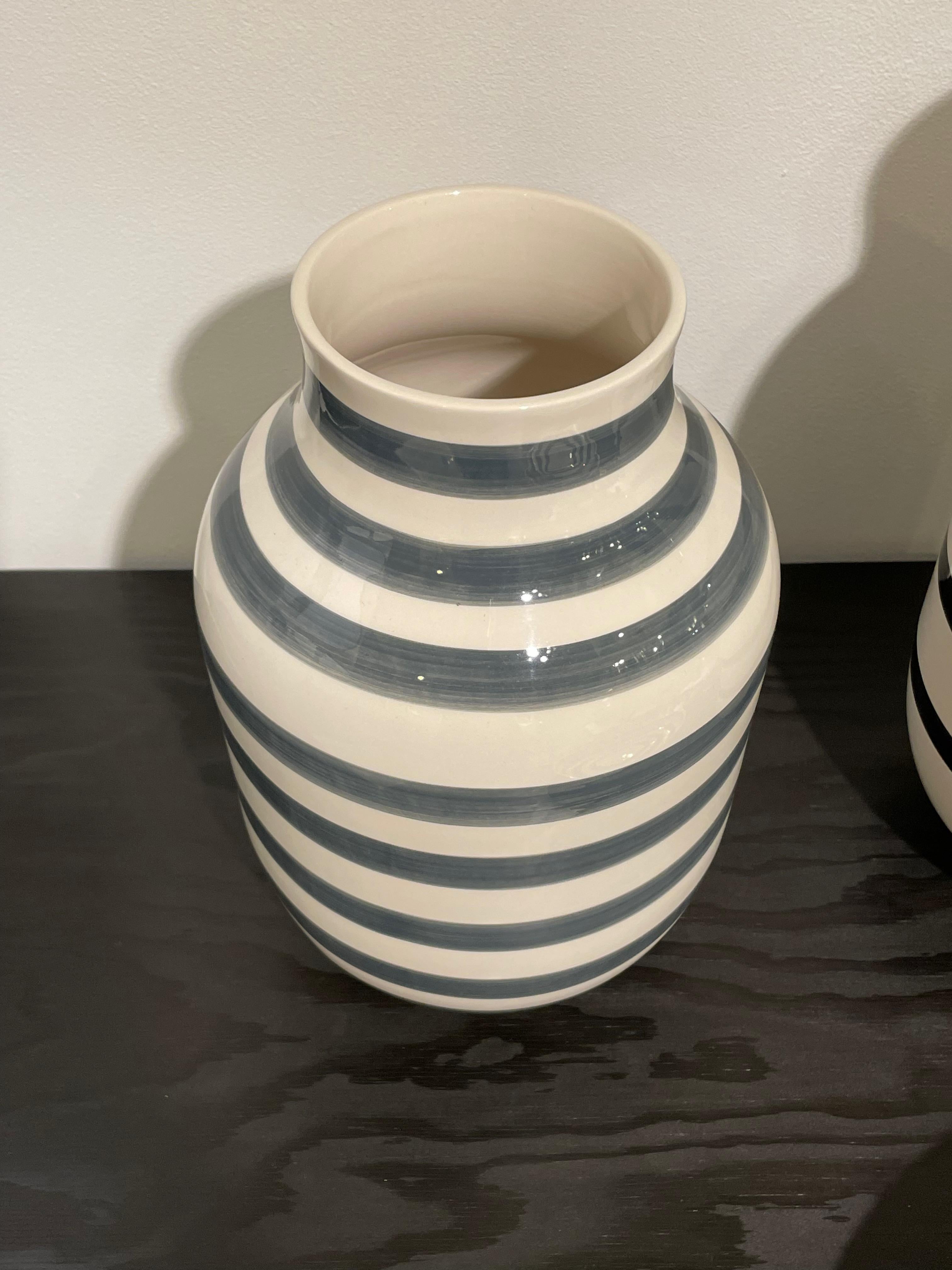 Mid century Danish horizontal stripe vase.
Cream ground with charcoal stripes.
Can hold water.
ARRIVING AUGUST
