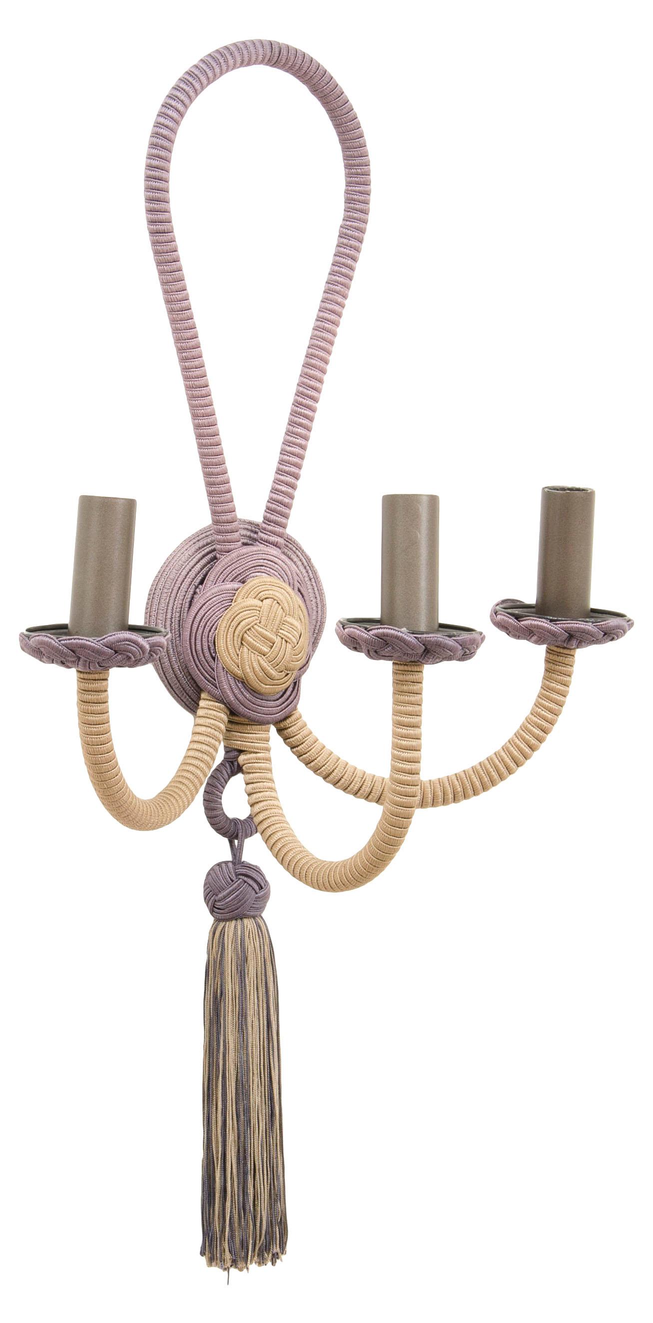 Three arm wrought iron structure is wrapped with silk cording with arms emanating from a central knot. Cording under the bobéches is shaped in traditional passementarie knotted detail. Custom sizes available.