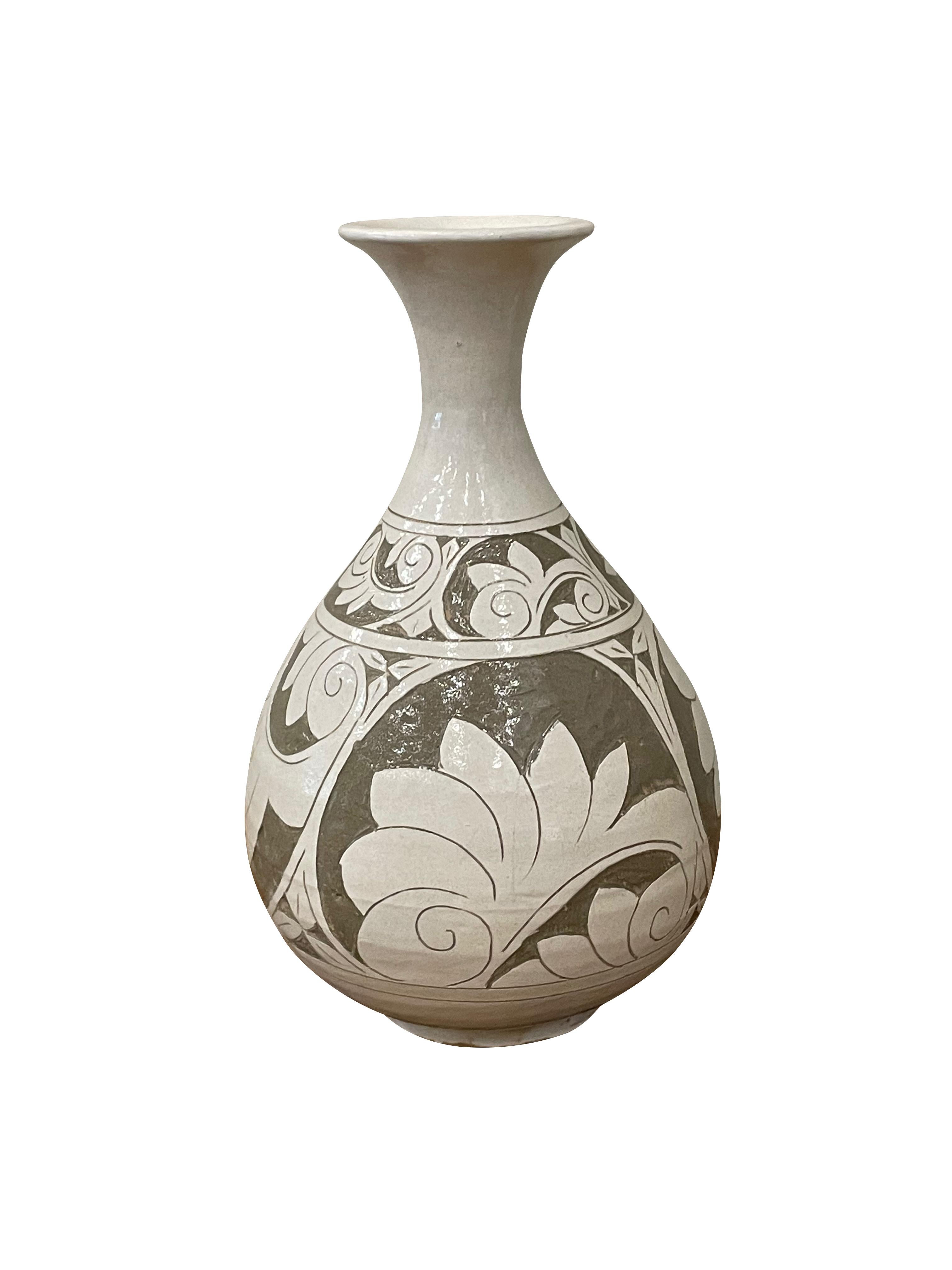 Contemporary Chinese tan ground with cream floral pattern overlay
Ceramic tulip shaped vase.
Part of a large collection.