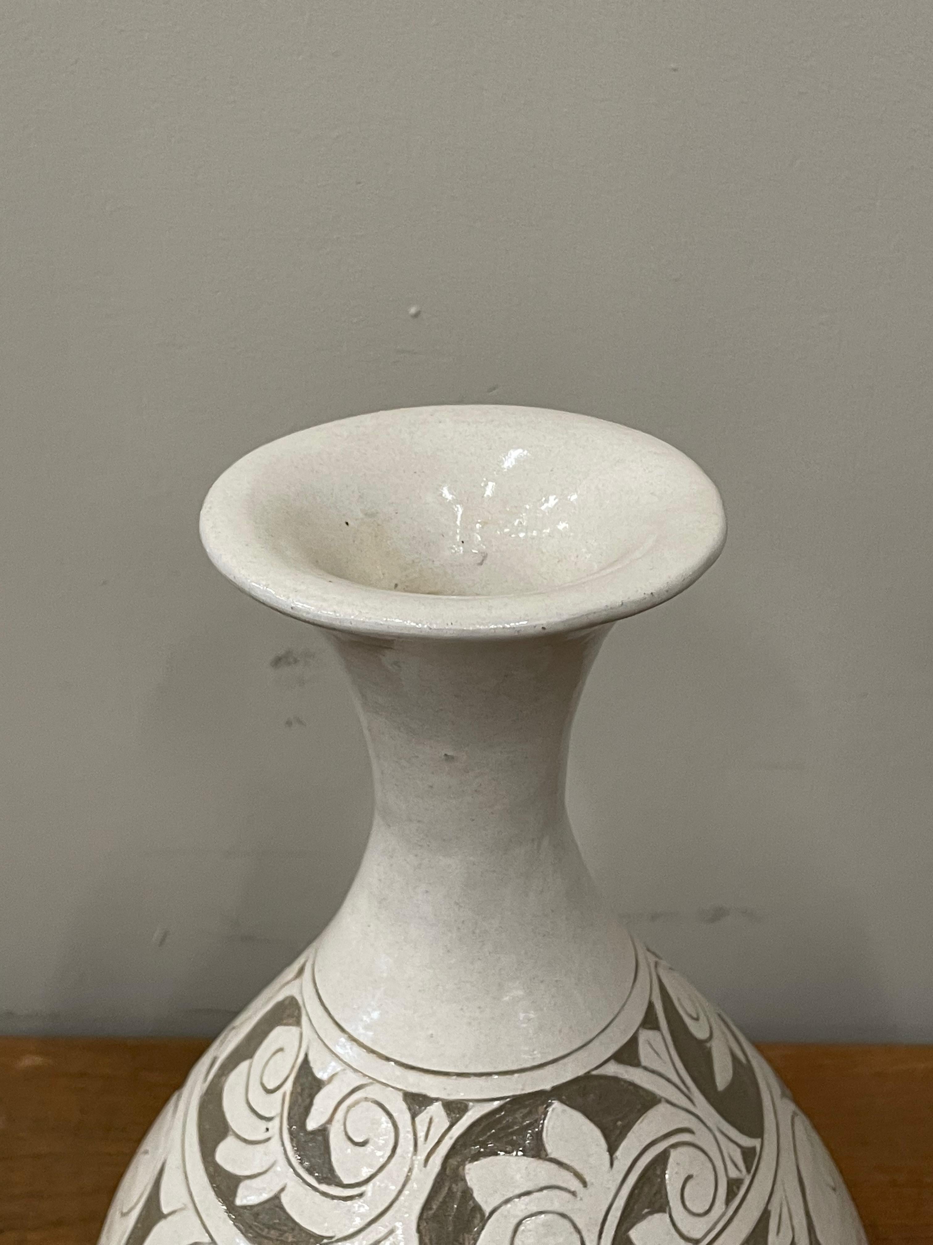 Chinese Cream And Tan Floral Embossed Tulip Shape Vase, China, Contemporary