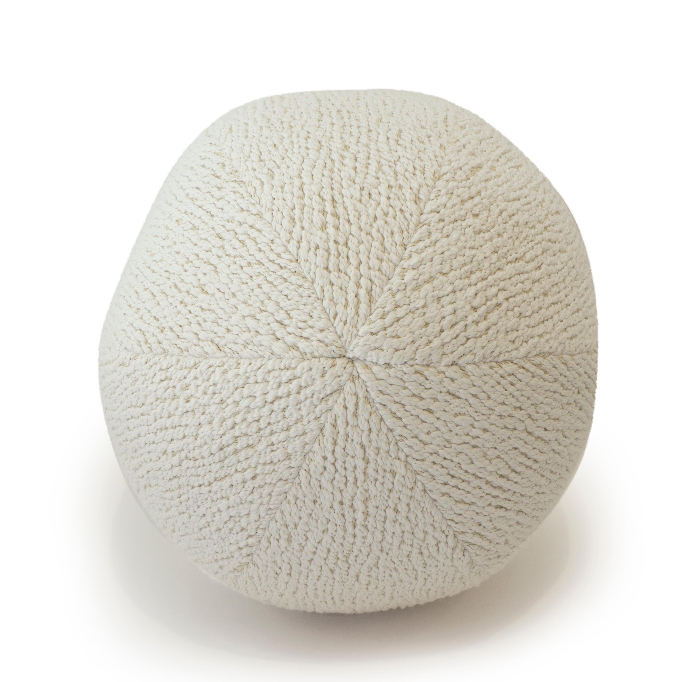 The braided ball pillow is made with a knotted wool and polyester blend fabric in a neutral cream color. All pillows are handmade at our studio in Norwalk, CT. 

Measurements:
Overall: 12” x 12”.
Disclaimer: Due to their handcrafted nature, the