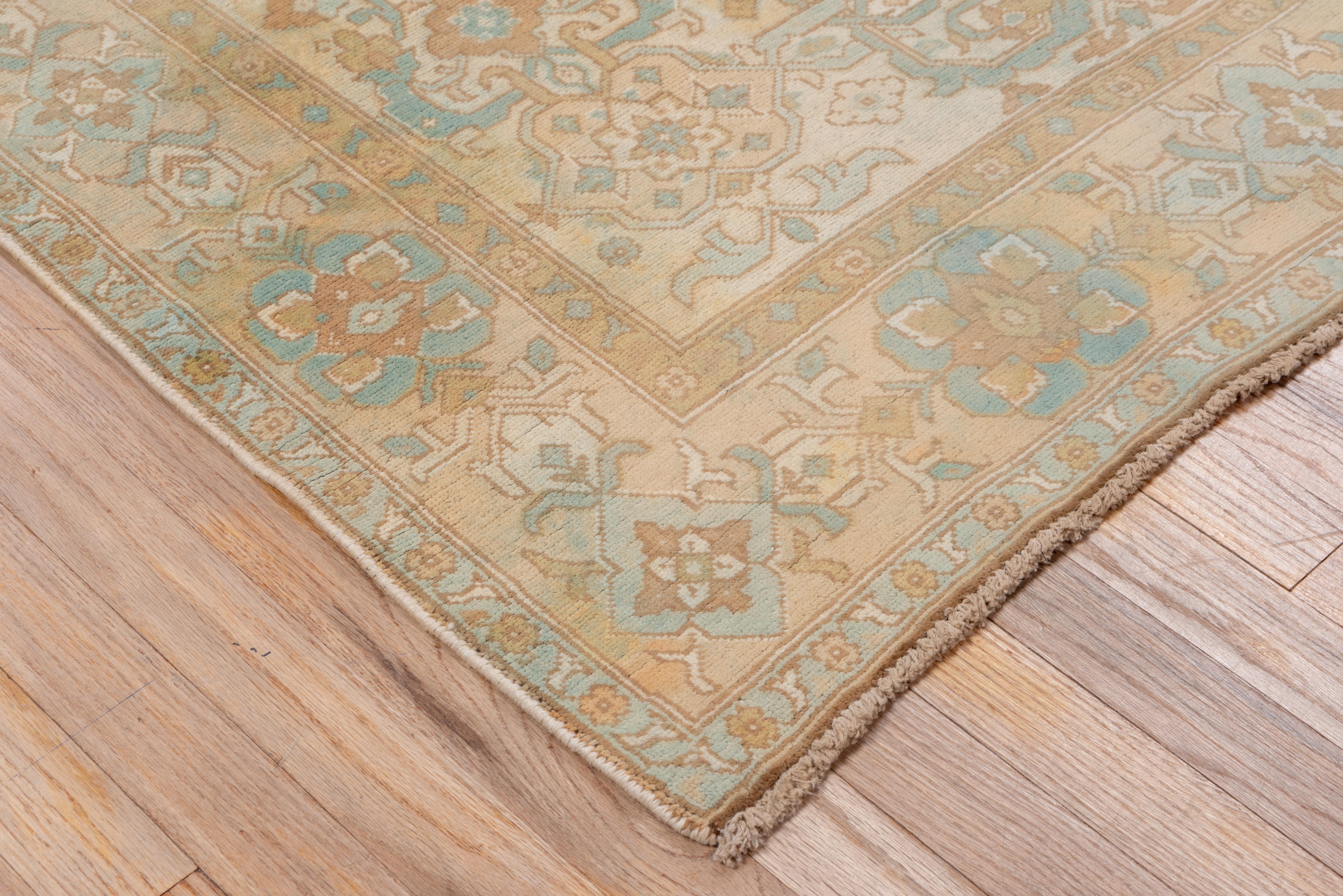 This Turkish East Anatolian town scatter rug has a subtle pattern of semi-geometric leaves around a squarish medallion, on a sand and cream ground. Buff main border with chains of flowers/palmettes. Moderate/medium weave on cotton. Accent colors are