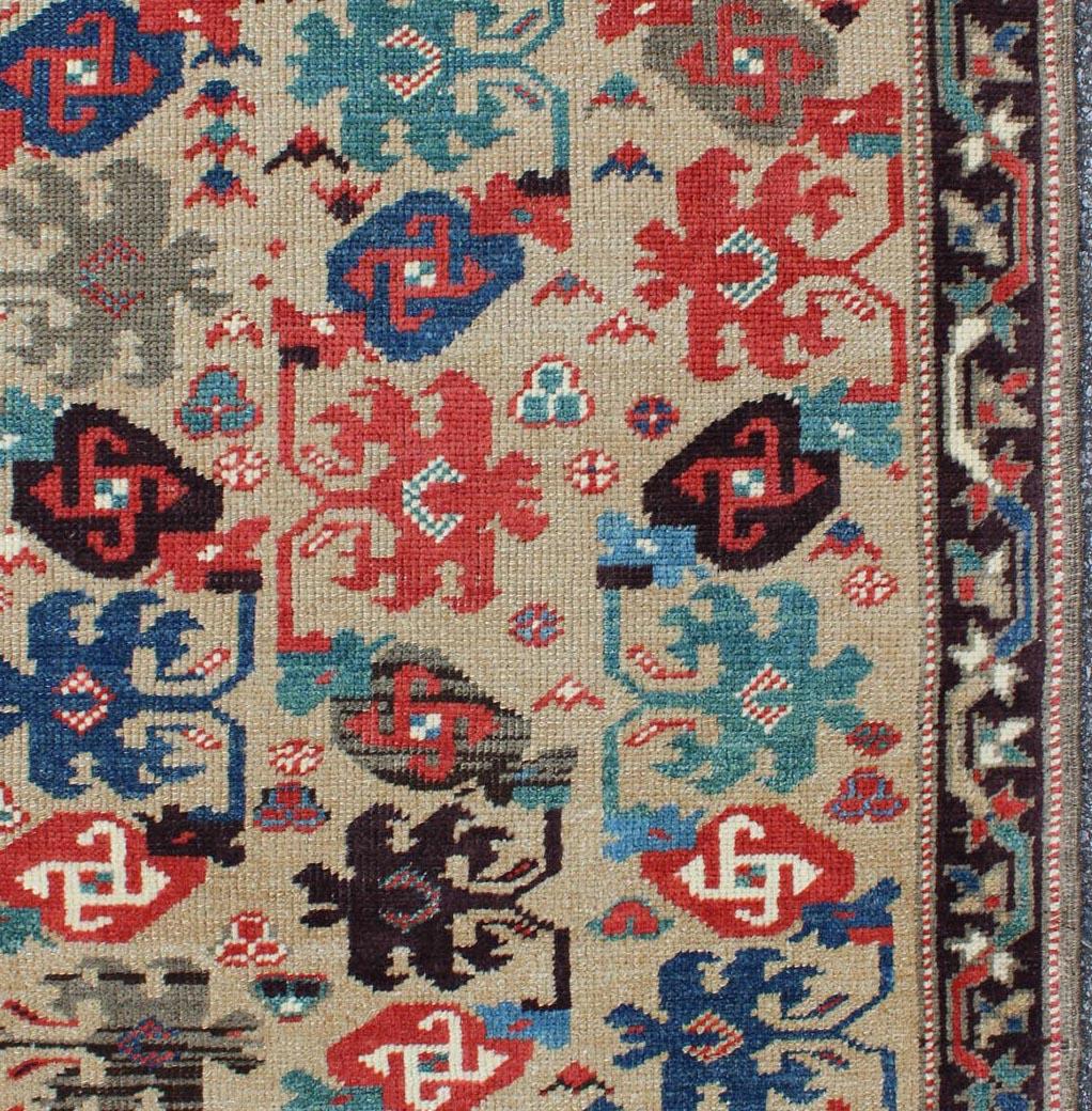 Cream Background Colorful Vintage Turkish Oushak Rug with All-Over Tribal Design In Excellent Condition In Atlanta, GA