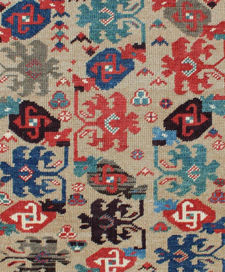 20th Century Cream Background Colorful Vintage Turkish Oushak Rug with All-Over Tribal Design
