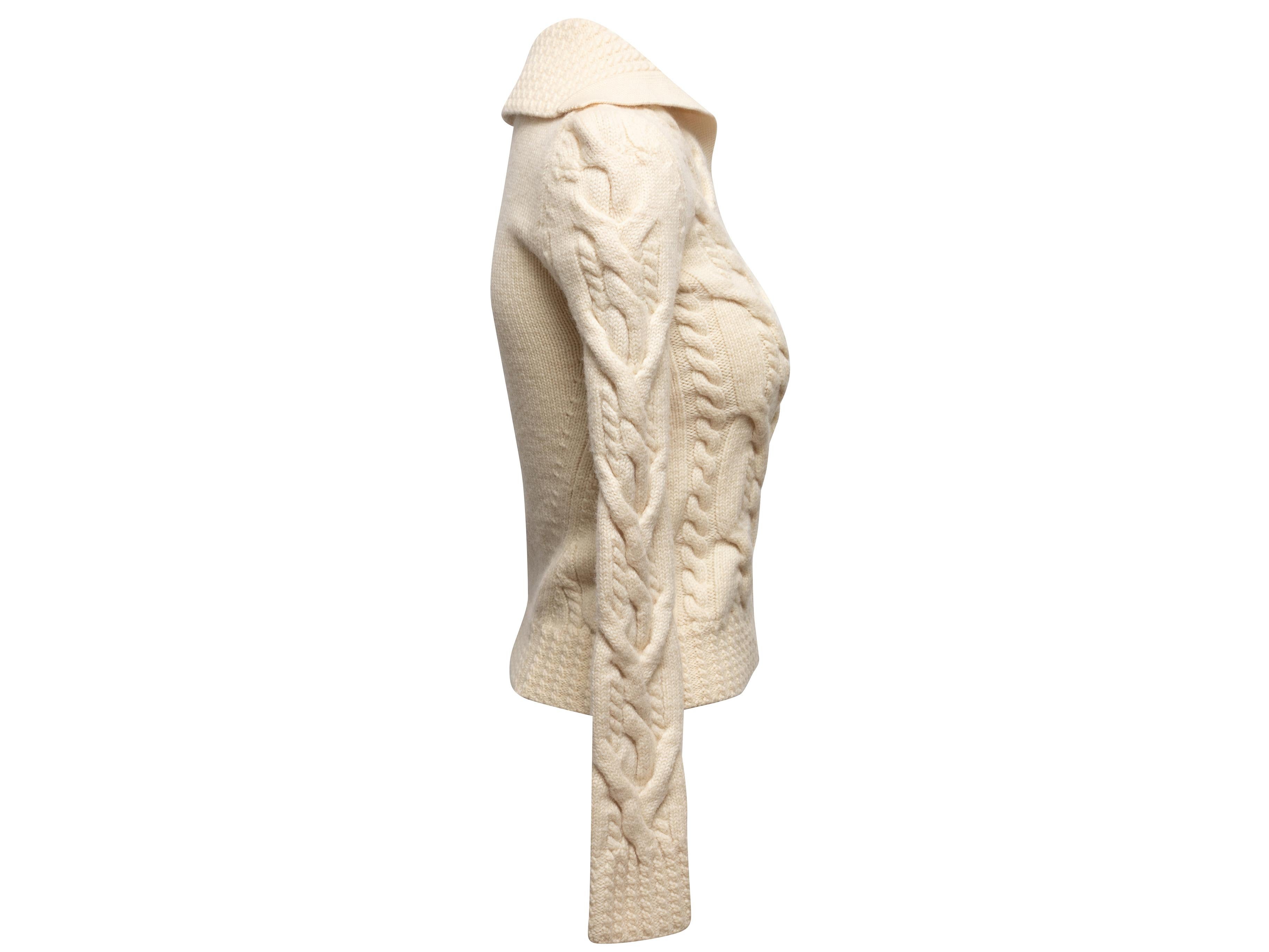 Cream cable knit sweater by Balenciaga. Sailor-style collar. V-neck. Long sleeves. 28