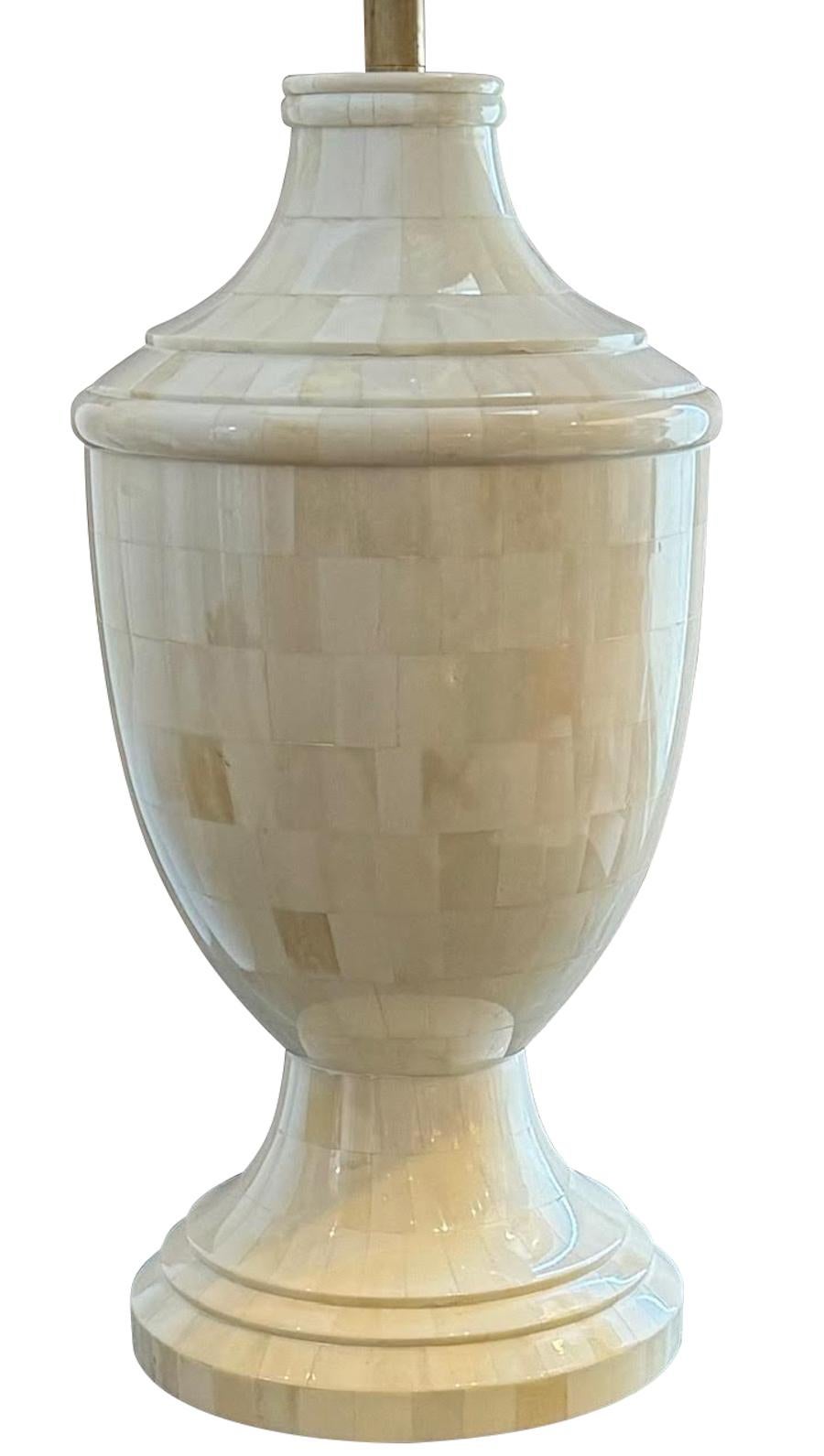 Contemporary Indonesian pair of rectangular shaped bone pieces finial shaped lamps.
Belgian linen shades.
Shade measures 20