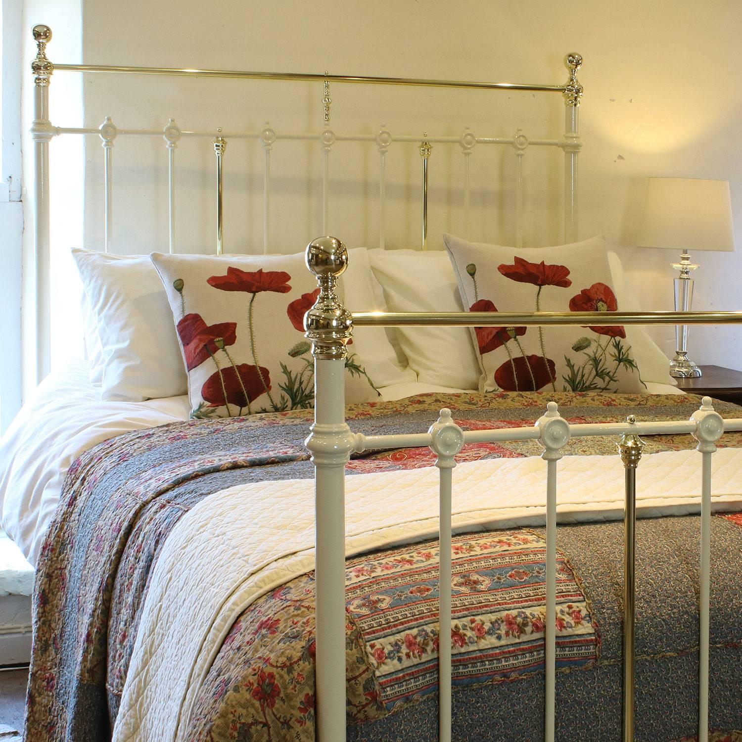 A brass and iron bed adapted from an original Victorian frame, circa 1895, with straight brass top rail and finished in soft cream.

This bed accepts a British king-size or American queen-size (60 inches, 5ft or 150cm) base and mattress